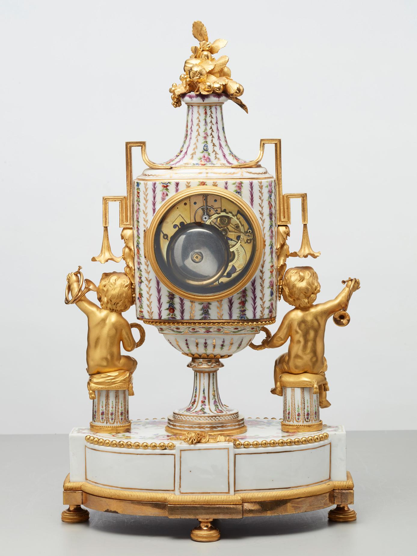 Gilt Rare French porcelain and gilt bronze mantel clock by Godon For Sale