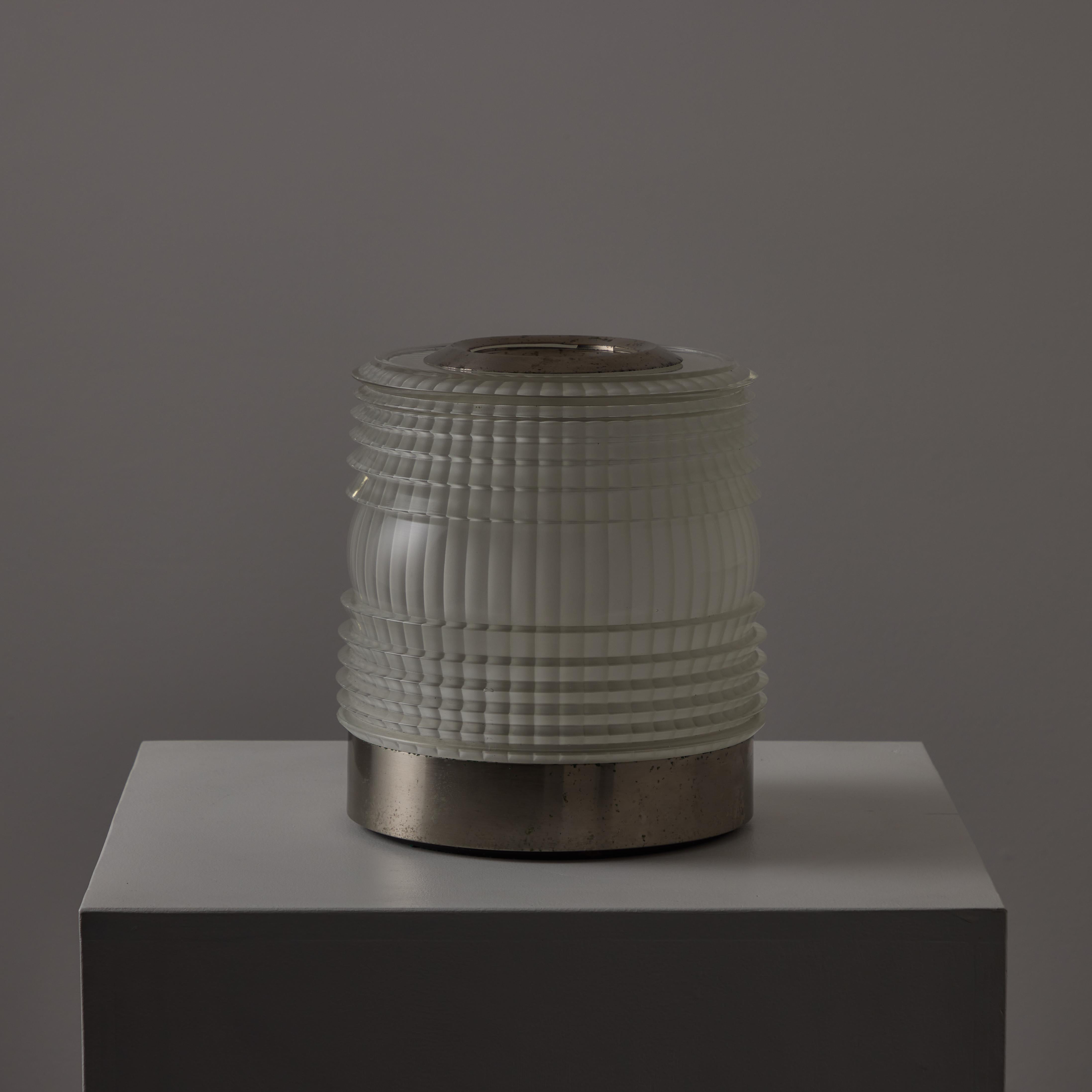 ‘Fresnel’ Table Lamp by Joe Colombo for Oluce Italy, 1966. Beautifully molded glass with an etched or sandblasted interior, allows for great diffusion. The glass is the star here with an overall minimal design. The light holds a single E27 socket