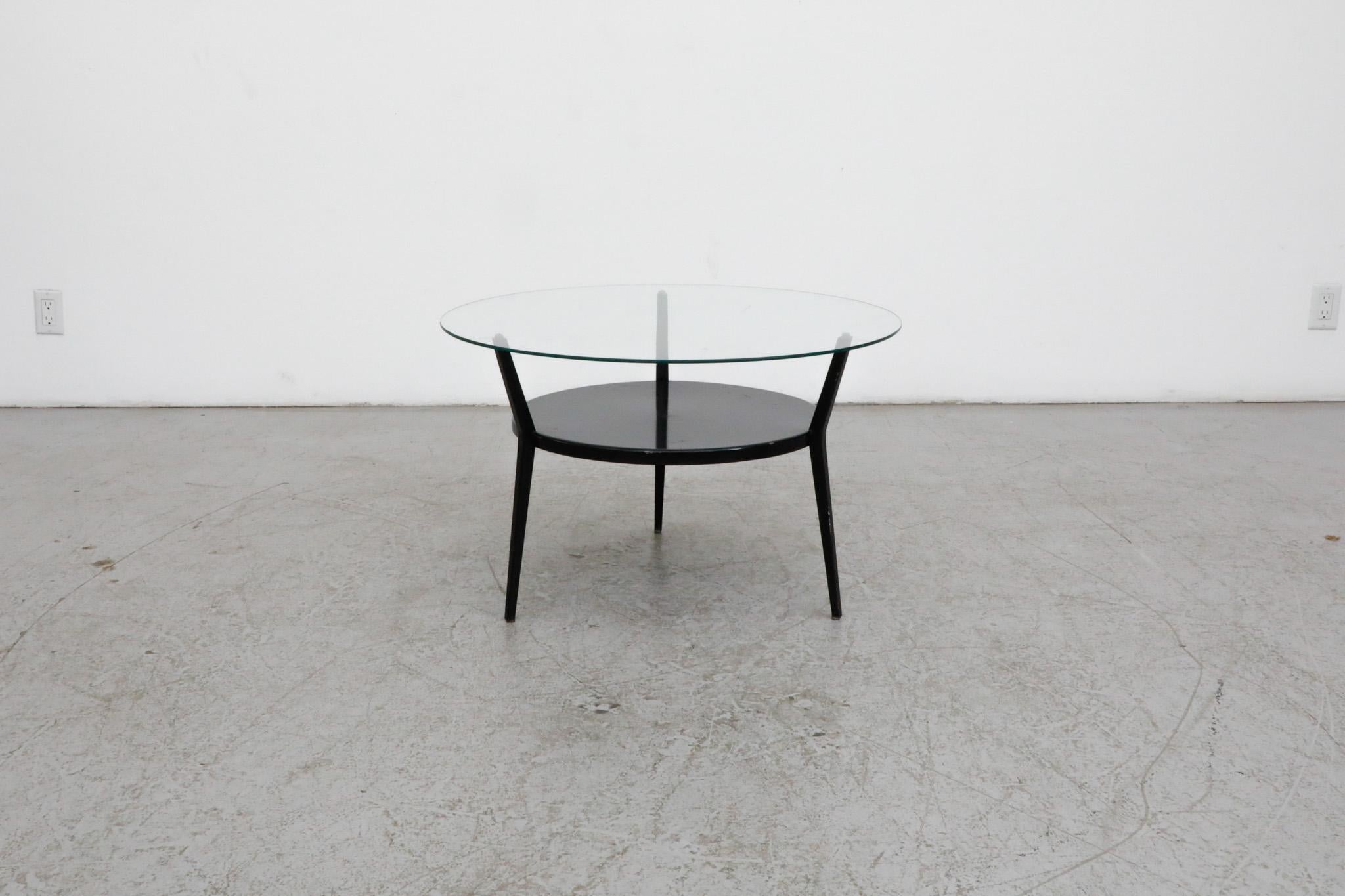 Rare table en métal noir et verre 