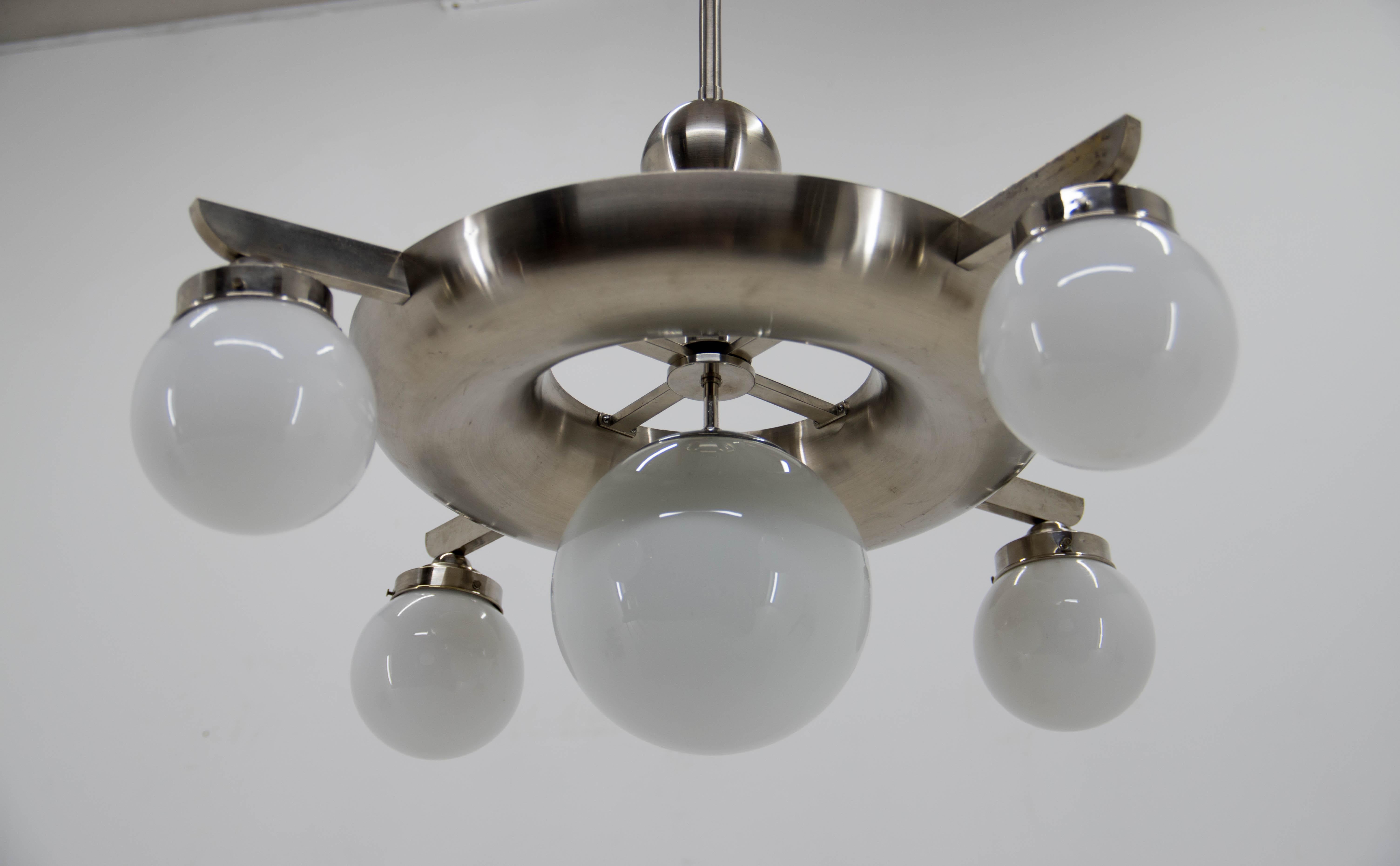 Very rare large Bauhaus 9-flamming nickel-plated chandelier designed by Franta Anyz and executed by IAS in late 1920s.
Rewired - three separate circuits allow for many different lighting options.
 4+4+1 E25-E27 bulbs, 9x40W, US wiring