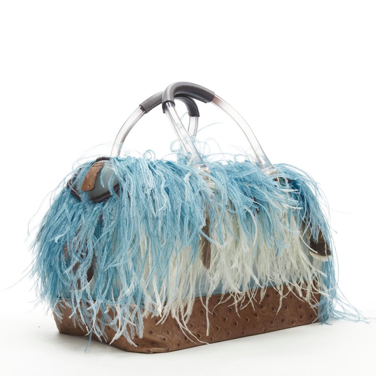 rare FURLA Candy Burlesque limited edition feather trim PVC Boston bag For  Sale at 1stDibs | furla pvc handbags, furla clear candy bag, blue feather  bag