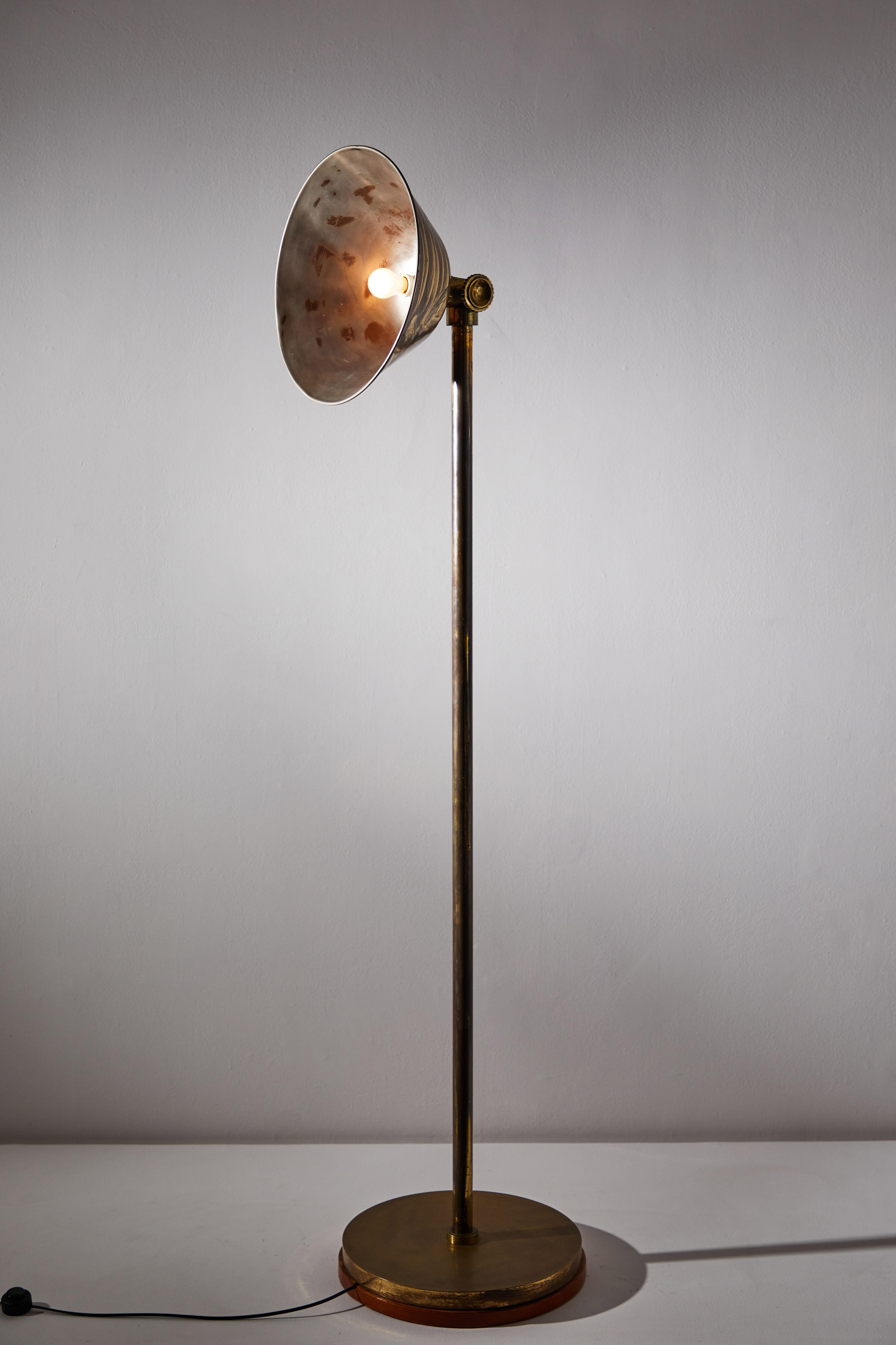 Rare and important GATCPAC floor lamp by Josep Torres Clavé. Designed and manufactured in Spain, in 1931. Brushed brass. Rewired for U.S. standards. At the top, there is a joint that can be adjusted by hand grips. Additionally, there is a