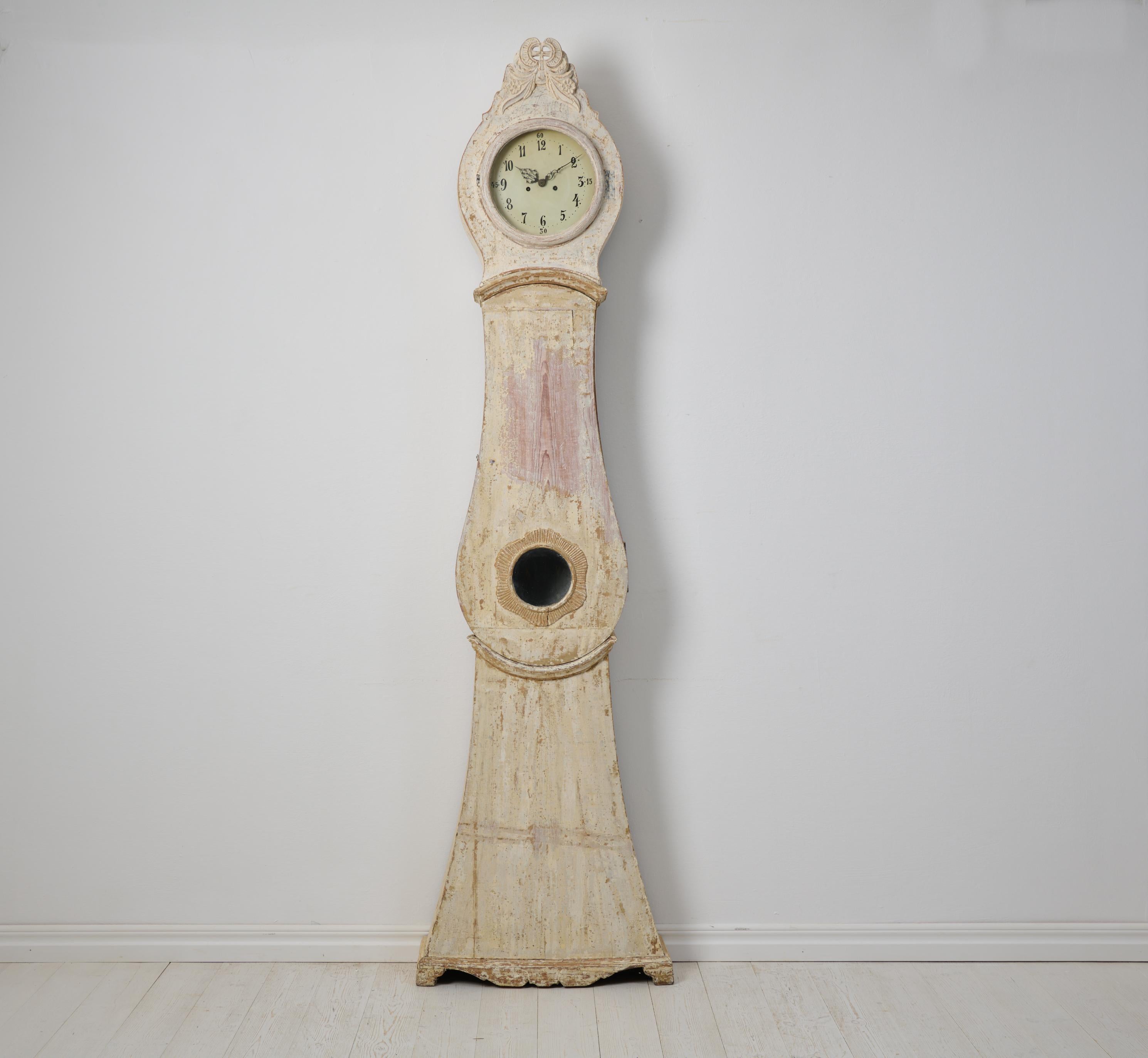 Rare genuine mora clock from northern Sweden. Unlock the enchantment of history with this rare genuine mora clock from northern Sweden, crafted around 1820. The case, meticulously made in solid pine, stands as a testament to the craftsmanship of its