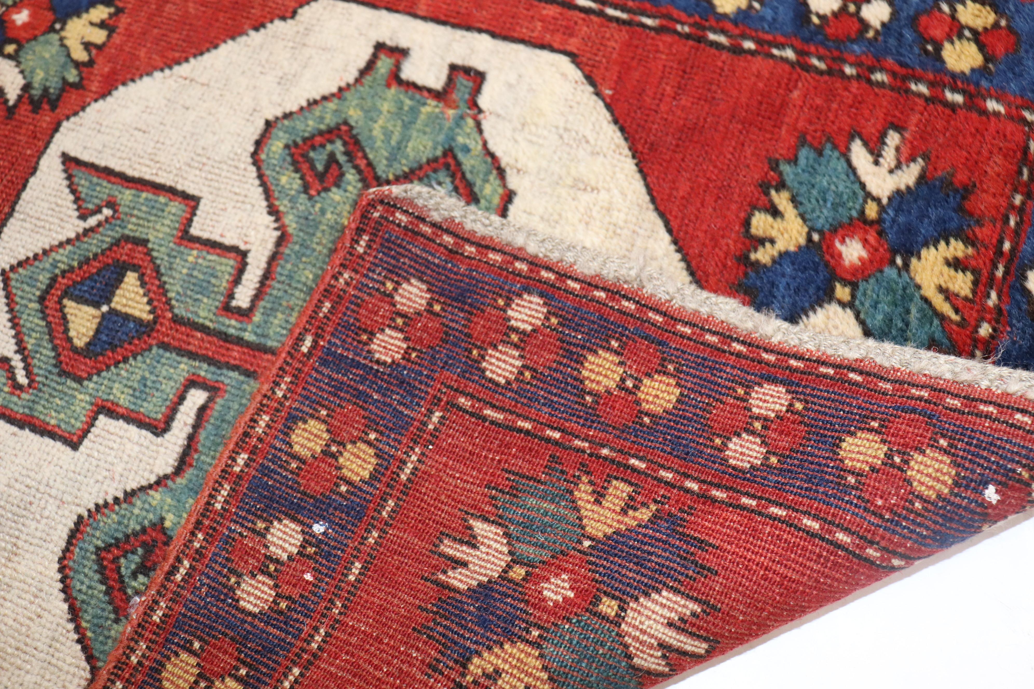 An early 20th century Caucasian Kazak rug with a geometric motif on a red ground. The size is original

Measures: 1'8” x 2'1”.

