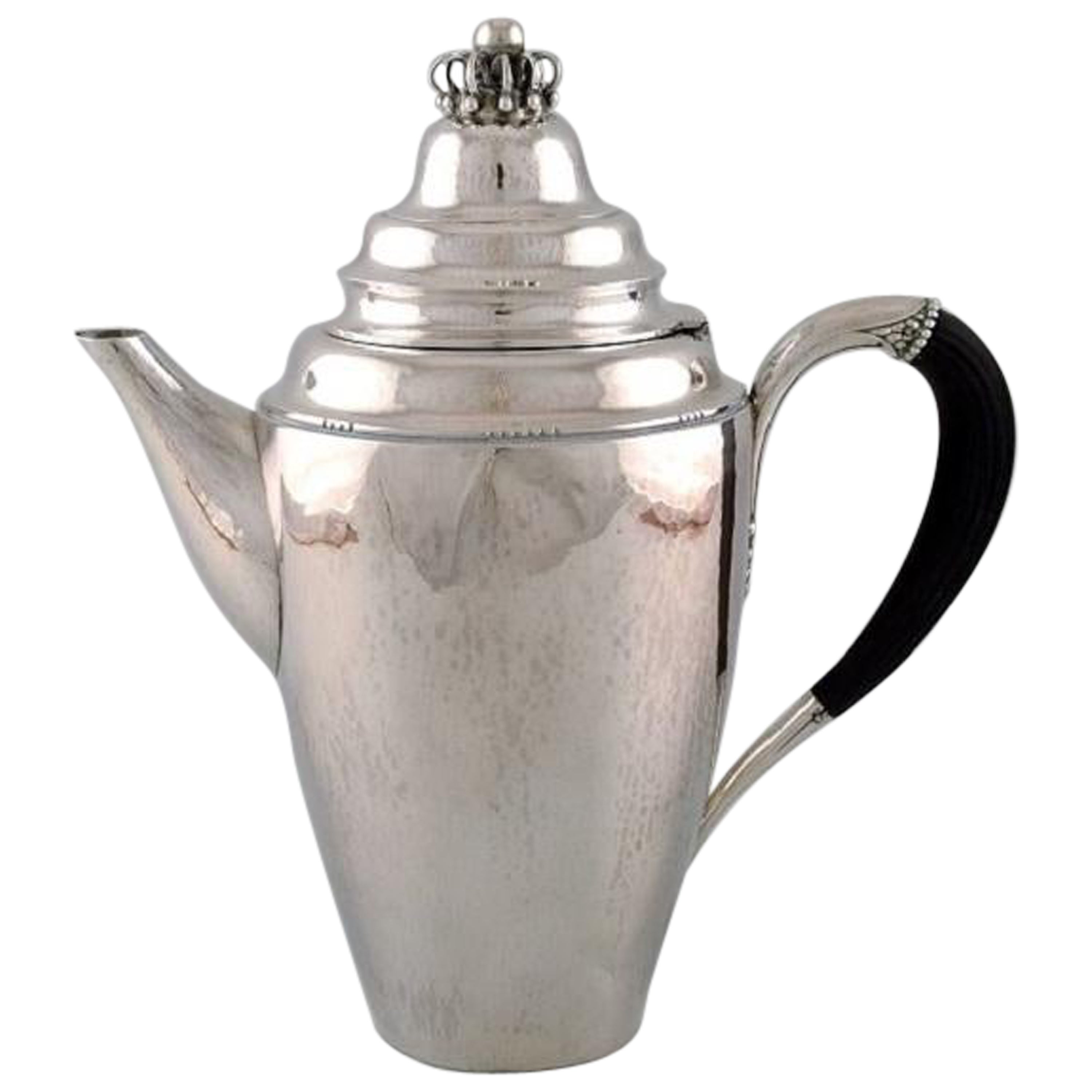 Rara caffettiera Georg Jensen in argento sterling con manico in ebano, datata 1915-30