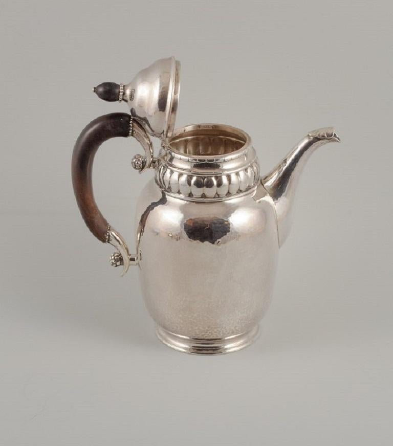 Danish Rare Georg Jensen coffee pot with accompanying creamer and sugar bowl in silver For Sale