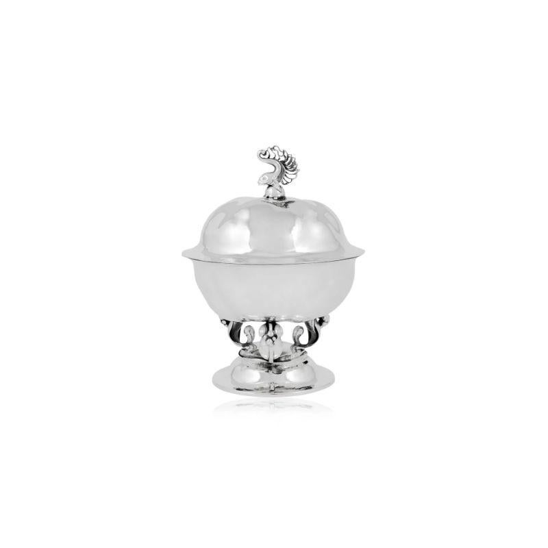 Very rare 830 silver Georg Jensen lidded bonbonniére #248 designed by Johan Rohde circa 1917. Normally Rohde’s designs tended to be less ornamental, one could wonder if this design was a collaboration with Georg Jensen?

Additional