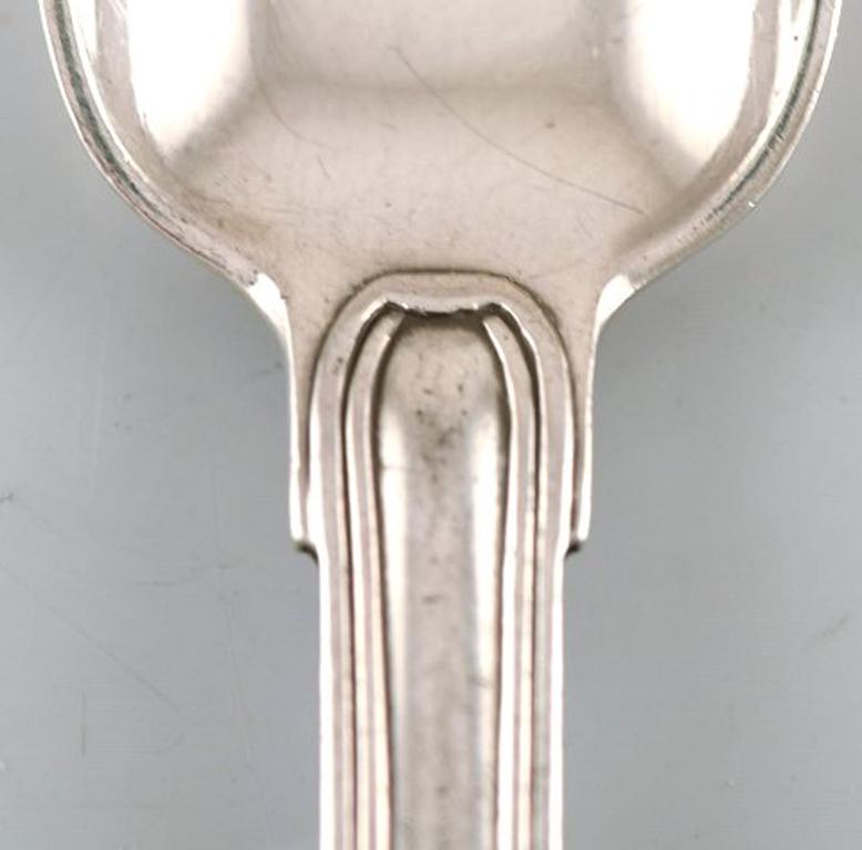 Rare Georg Jensen Old Danish coffee spoon in sterling silver. Ten pieces in stock.
In very good condition.
Measures: 11 cm.
Stamped.
Large selection of Georg Jensen Old Danish in stock.