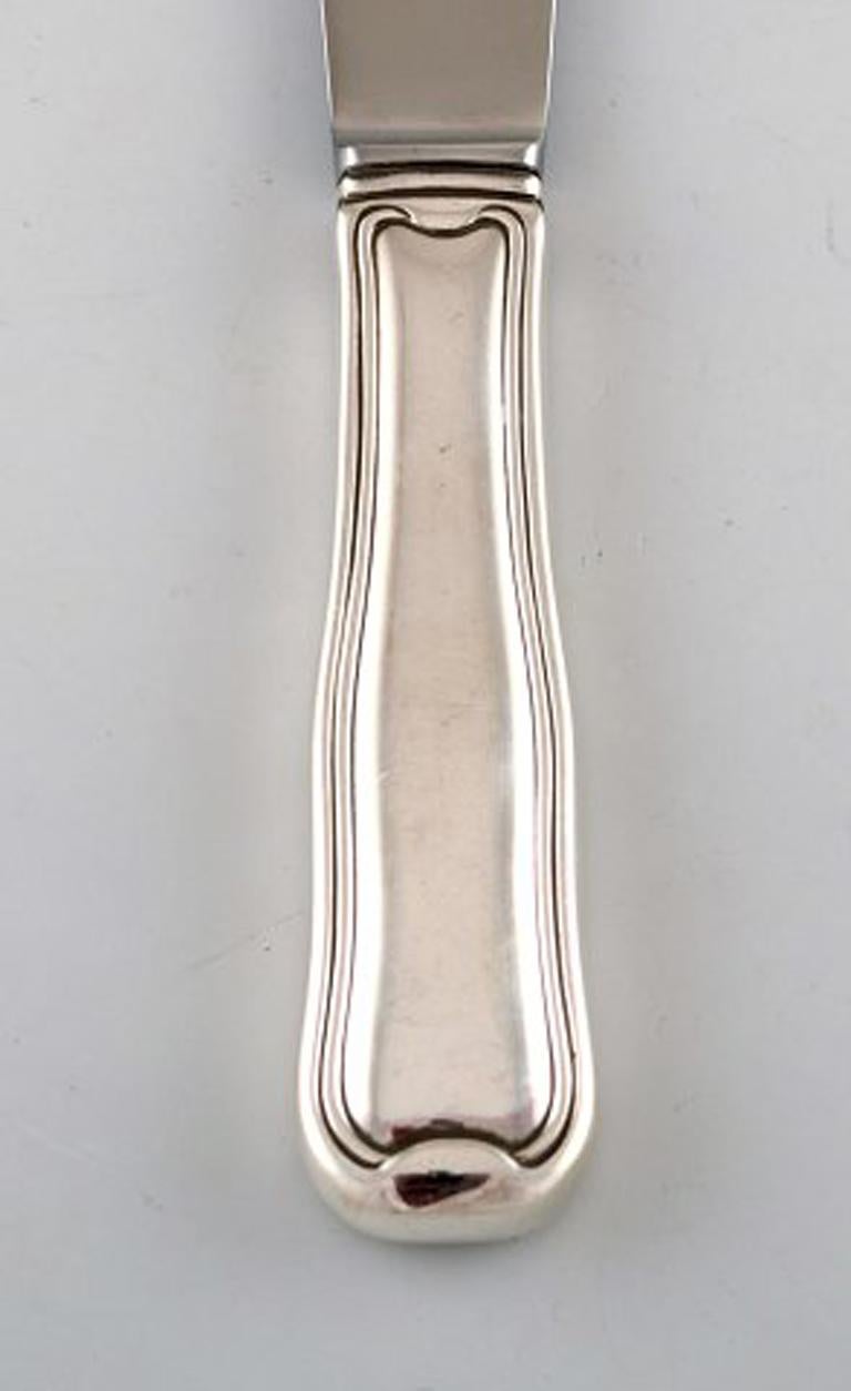 Rare Georg Jensen Old Danish dinner knife in sterling silver. 12 pieces in stock.
In very good condition.
Measures: 22,5 cm.
Stamped.
Large selection of Georg Jensen Old Danish in stock.