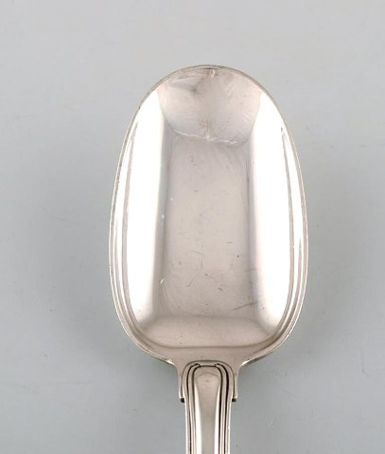 Rare Georg Jensen Old Danish dinner spoon in sterling silver. Two pieces in stock.
In very good condition.
Measures: 19.7 cm.
Stamped.
Large selection of Georg Jensen Old Danish in stock.