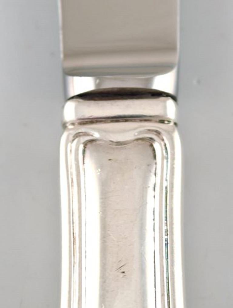 Rare Georg Jensen Old Danish fruit knife in sterling silver. Four pieces in stock.
In very good condition.
Measures: 16,5 cm.
Stamped.
Large selection of Georg Jensen Old Danish in stock.