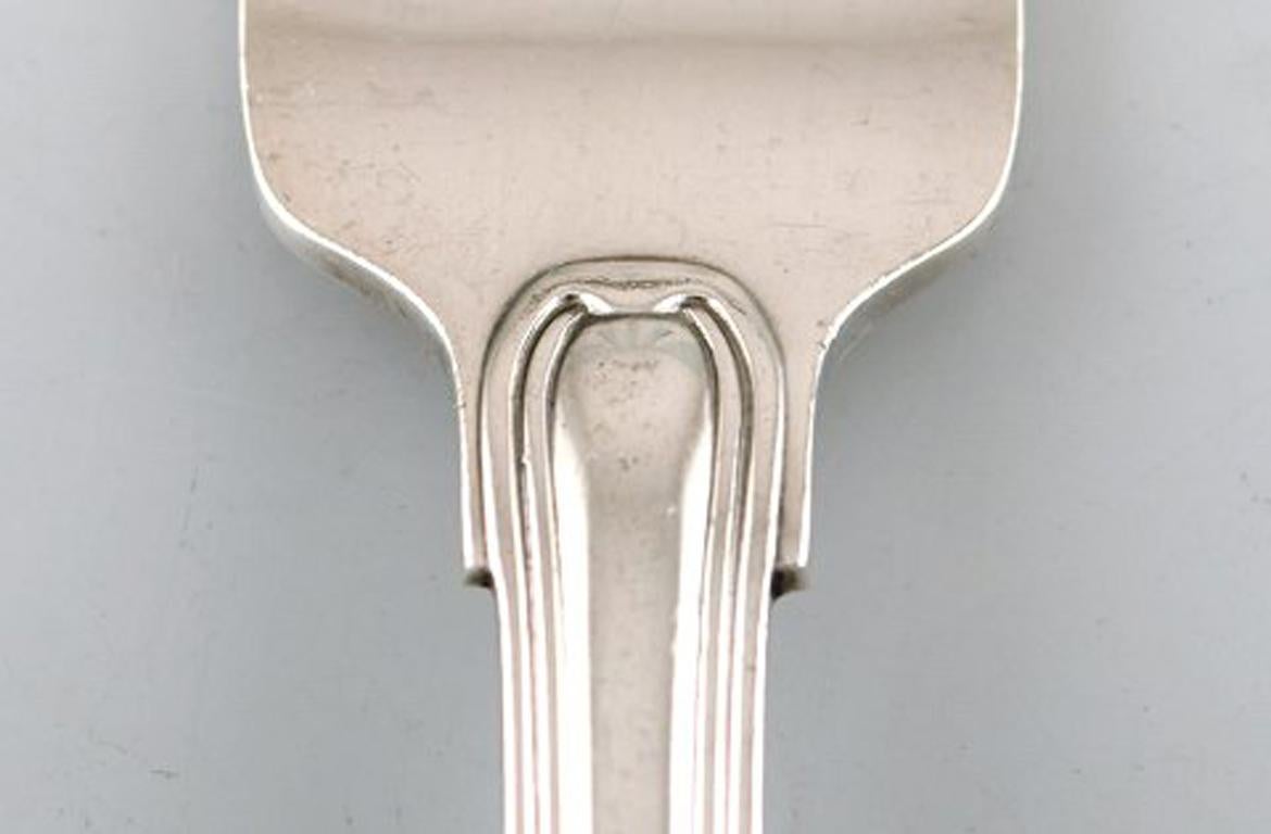 Rare Georg Jensen Old Danish lunch fork in sterling silver. Five pieces in stock.
In very good condition.
Measures: 18 cm.
Stamped.
Large selection of Georg Jensen Old Danish in stock.