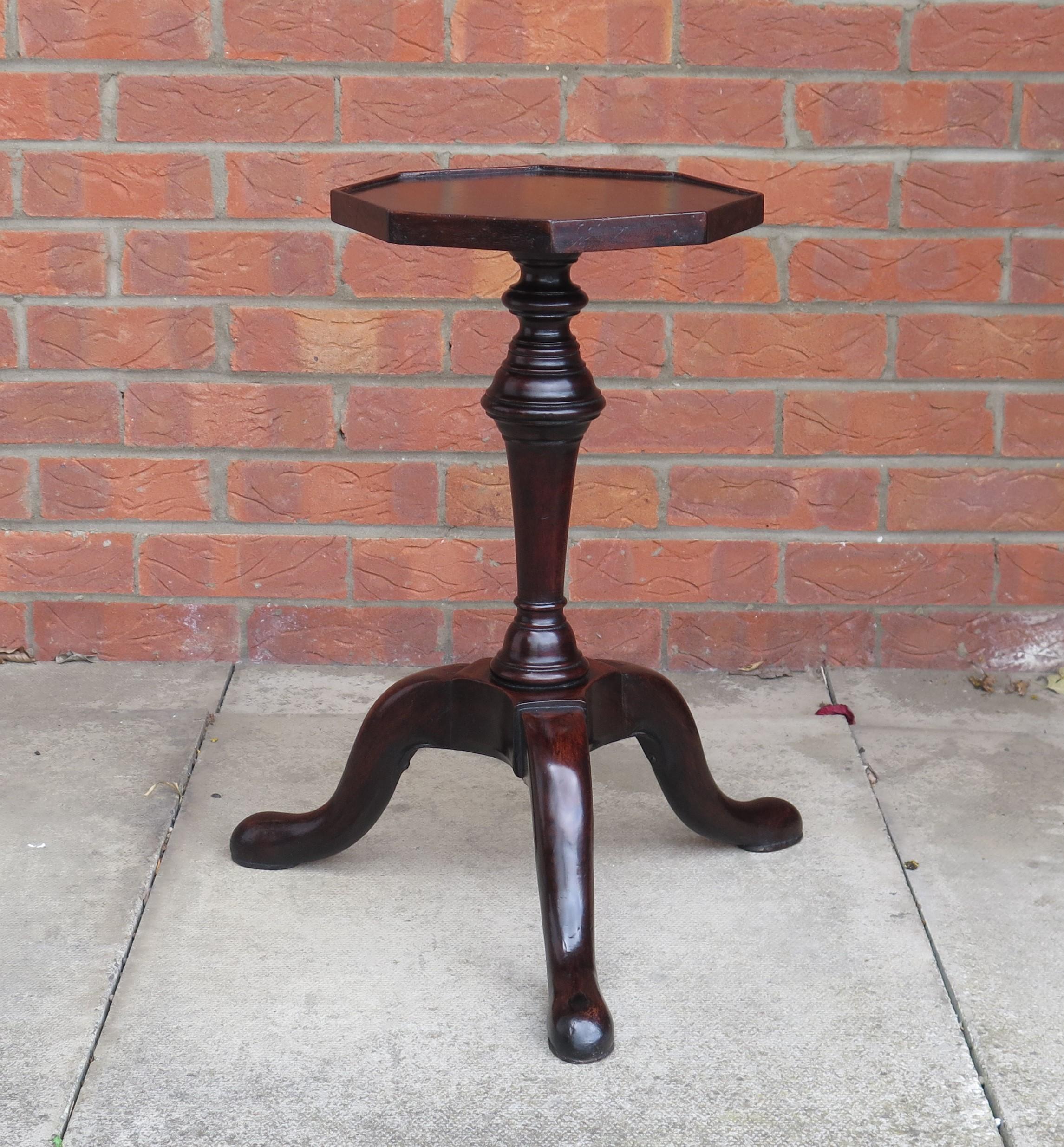 This is a rare Georgian Kettle or Candle Stand made from mahogany in the early to mid-18th century, George II period, circa 1745 or possibly earlier in the 18th century.

Candle stands of this age are rare and hard to find.
The piece is very well