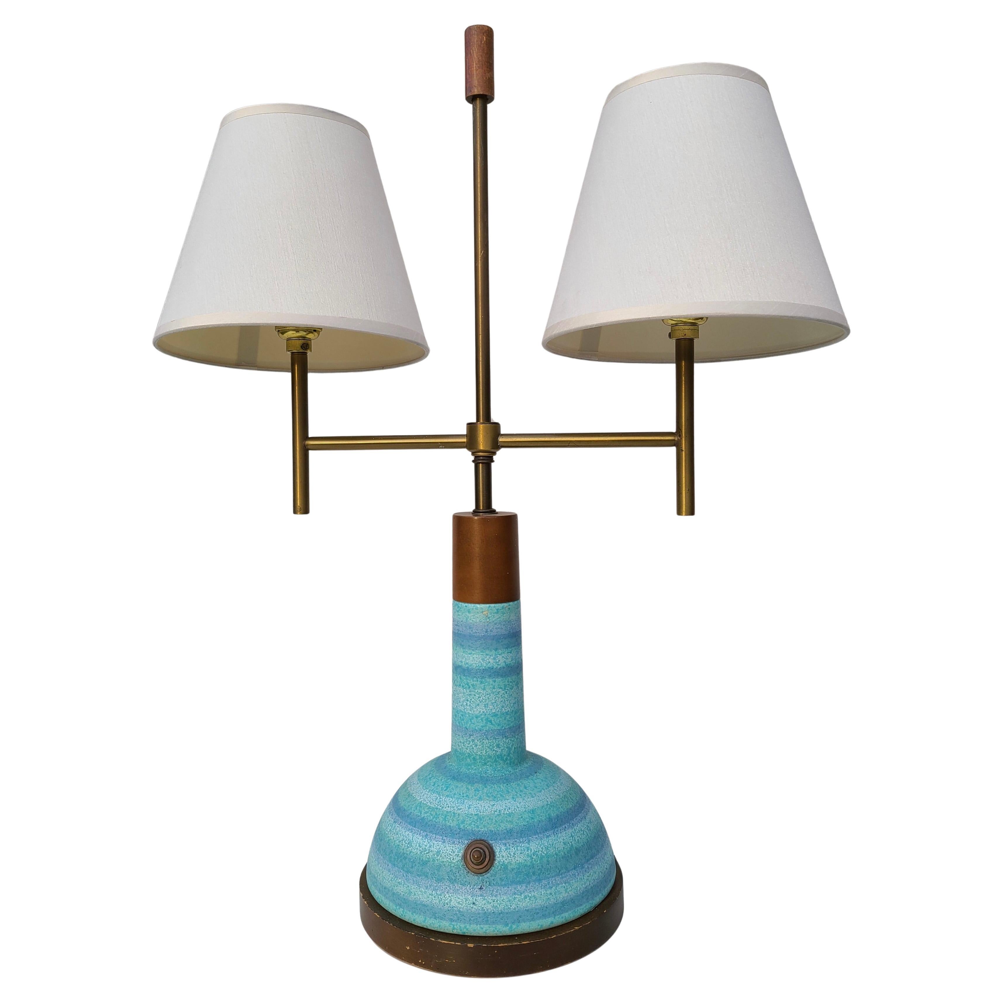 Rare Student Lamp designed by George Nelson for Phil-Mar Lamps.
Blue Striped Ceramic Body, Brass, and Walnut finished Maple. 
Two Shades are replacement.

Similar styling trend to the Paul McCobb for Directional Northcraft lamps.