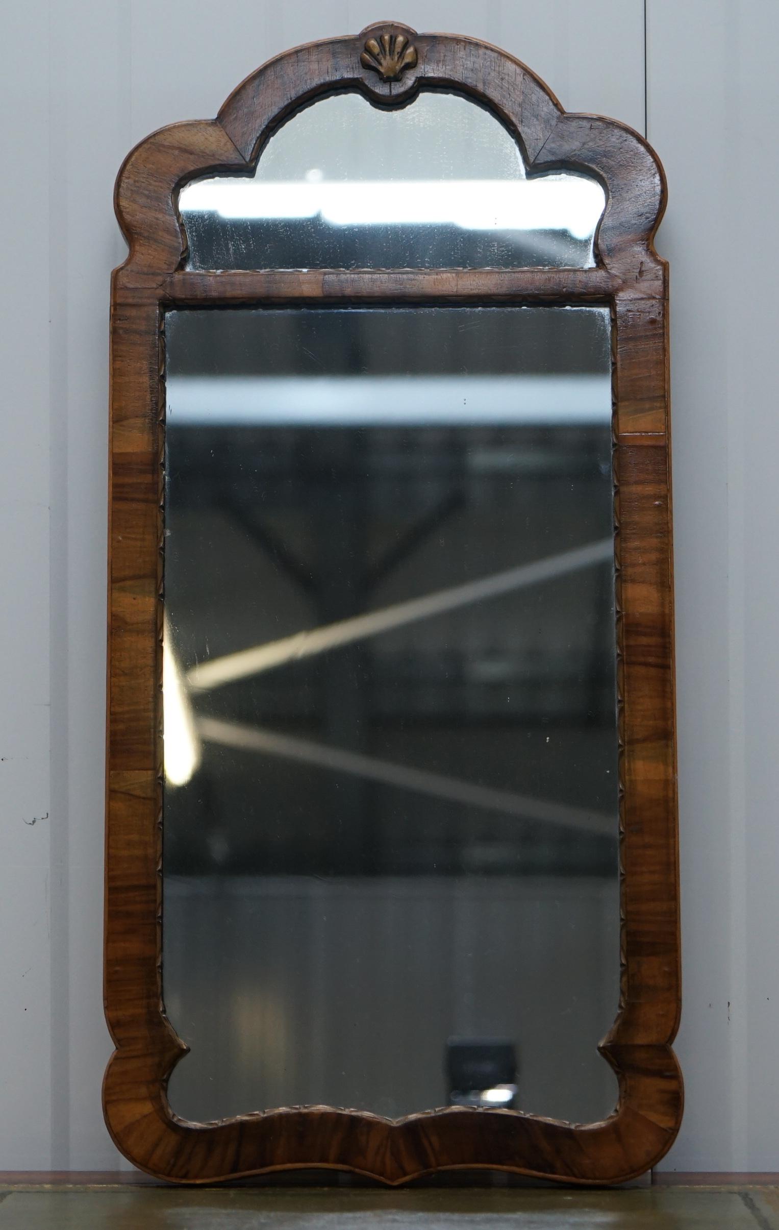 We are delighted to offer for sale this lovely circa 1800 walnut Georgian mirror circa 1800 with original mercury glass

A good looking and a well made decorative piece of furniture, the mercury plate glass is original and has a lovely warm blue