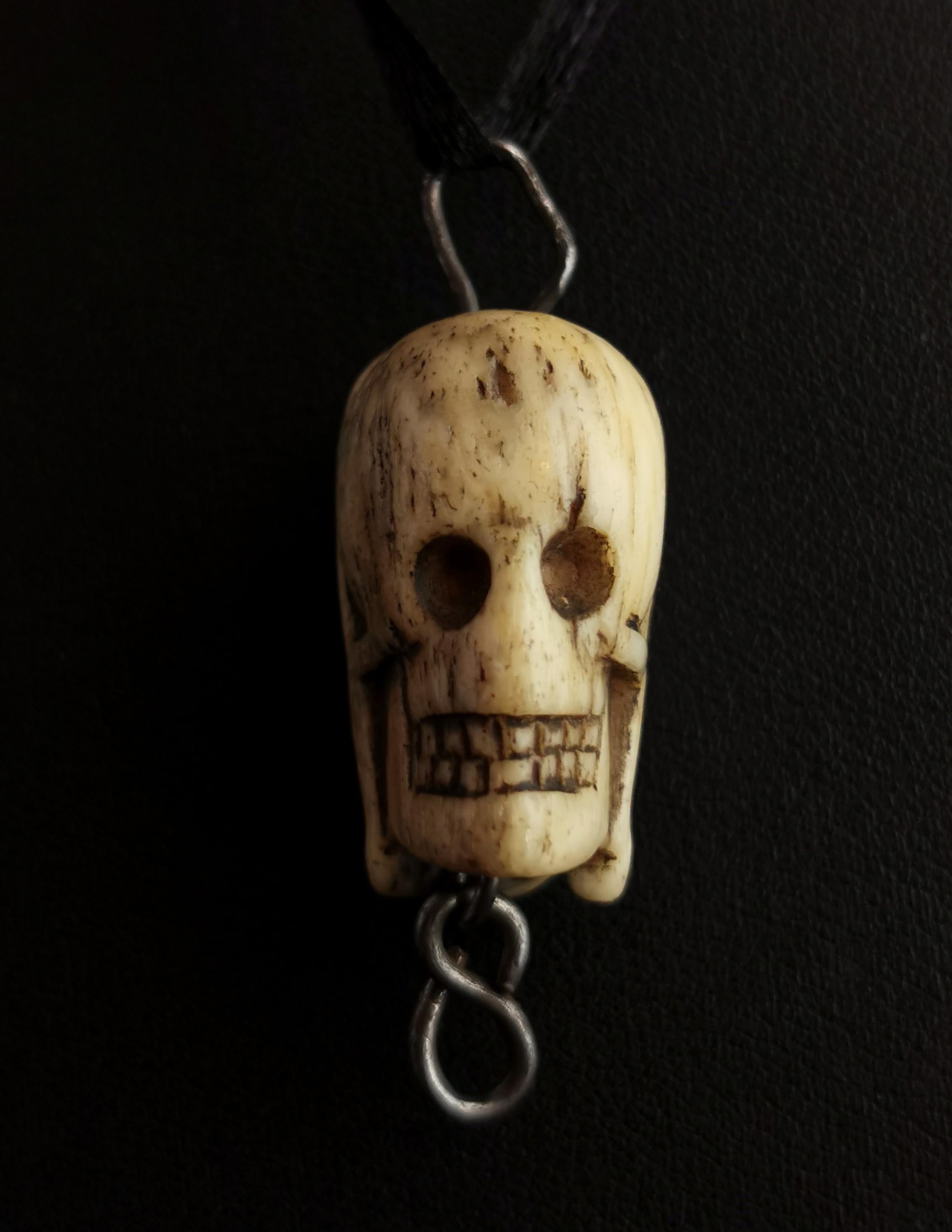A very rare antique, Georgian, 18th century bone skull and jesus pendant.

This is a very scarce piece the two sided pendant depicting a skull on one side and a depiction of jesus on the other.

Almost certainly a Memento Mori piece the subject is