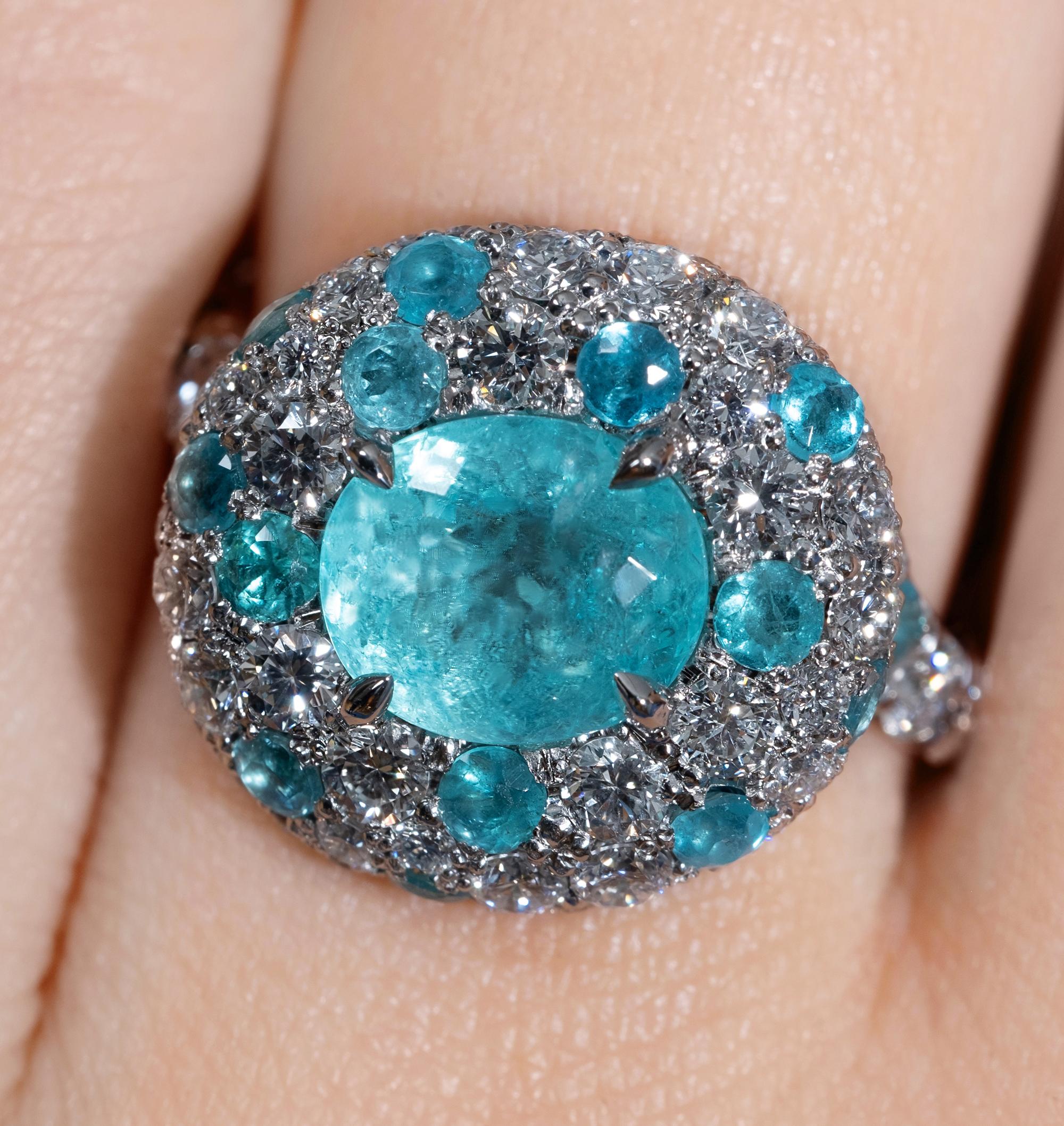Highly collectable 5ctw Natural Paraiba Tourmaline and Diamond Platinum Ring, GIA CERTIFIED.

A high-fashion ring from another planet! This jewel will make a great addition to any GEM/jewelry collection or a perfect alternative for the Modern