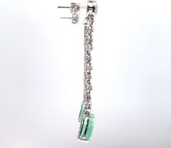 RARE GIA CERT 3.35 & 3.57 crt paraiba tourmaline 2.76 crt diamond drop earring