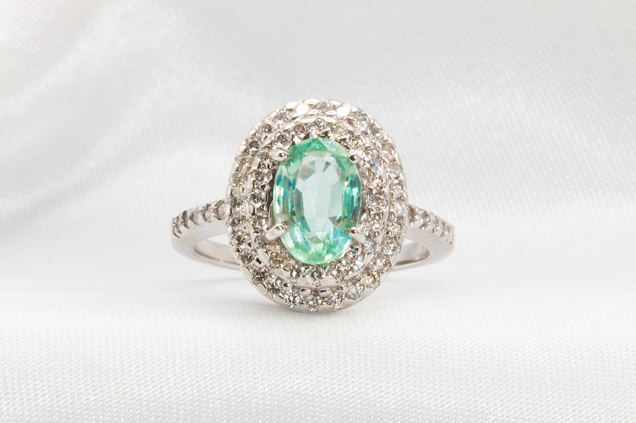 Rare GIA Certified 1.75 Ct. Alexandrite Ring in 18K White Gold with Diamonds

Discover timeless sophistication in this exquisite vintage ring featuring a rare, color-changing Alexandrite at its heart. Set in gleaming 18K white gold, the centerpiece