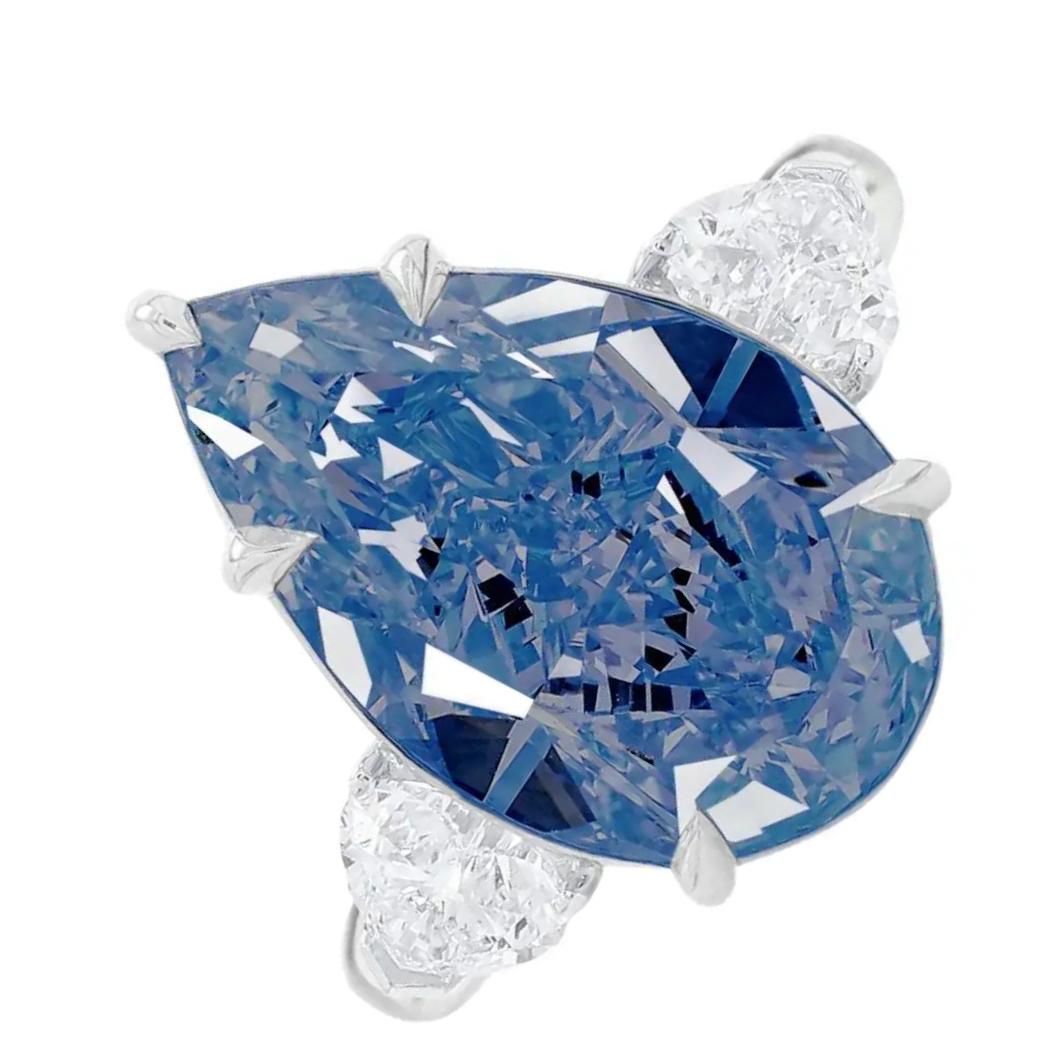 A magnificent and rare Fancy  Blue Pear Shaped Diamond, total weight 5 carat, vs2 clarity, certified by the GIA. 
