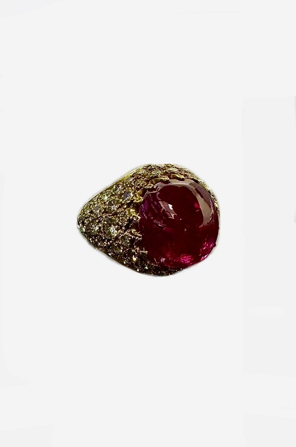 DeKara Designs Collection 

Metal- 18K Yellow Gold, .750.

Stones- 1 Cushion Cabochon No Heat Afghanistan Ruby 7.91 ,64 Round Diamonds F-G Color VS1-VS2 Clarity 2.25 Carats.

GIA Report Number 2231362473

Art Deco 18K Yellow Gold Cabochon Cushion