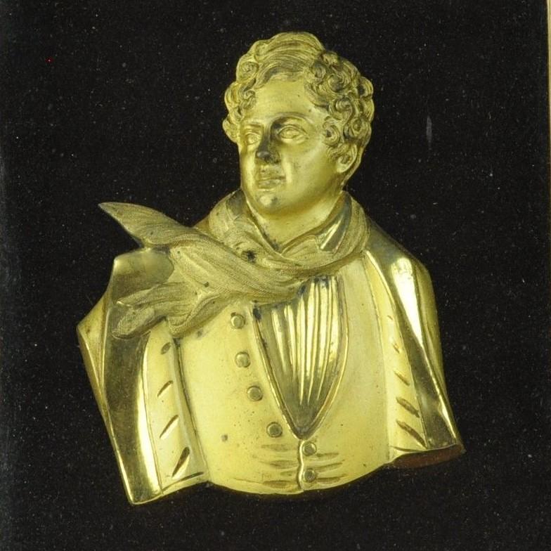 A fine and rare gilt bronze bust of George IV mounted in it's original glazed rosewood frame.