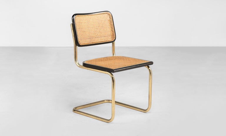 Rare gilt metal cantilever chair by Marcel Breuer, circa 1928

Gilt metal, ebonized and cane cantilever chair, model Cesca by Marcel Breuer. Designed in 1928. Only 1 available.