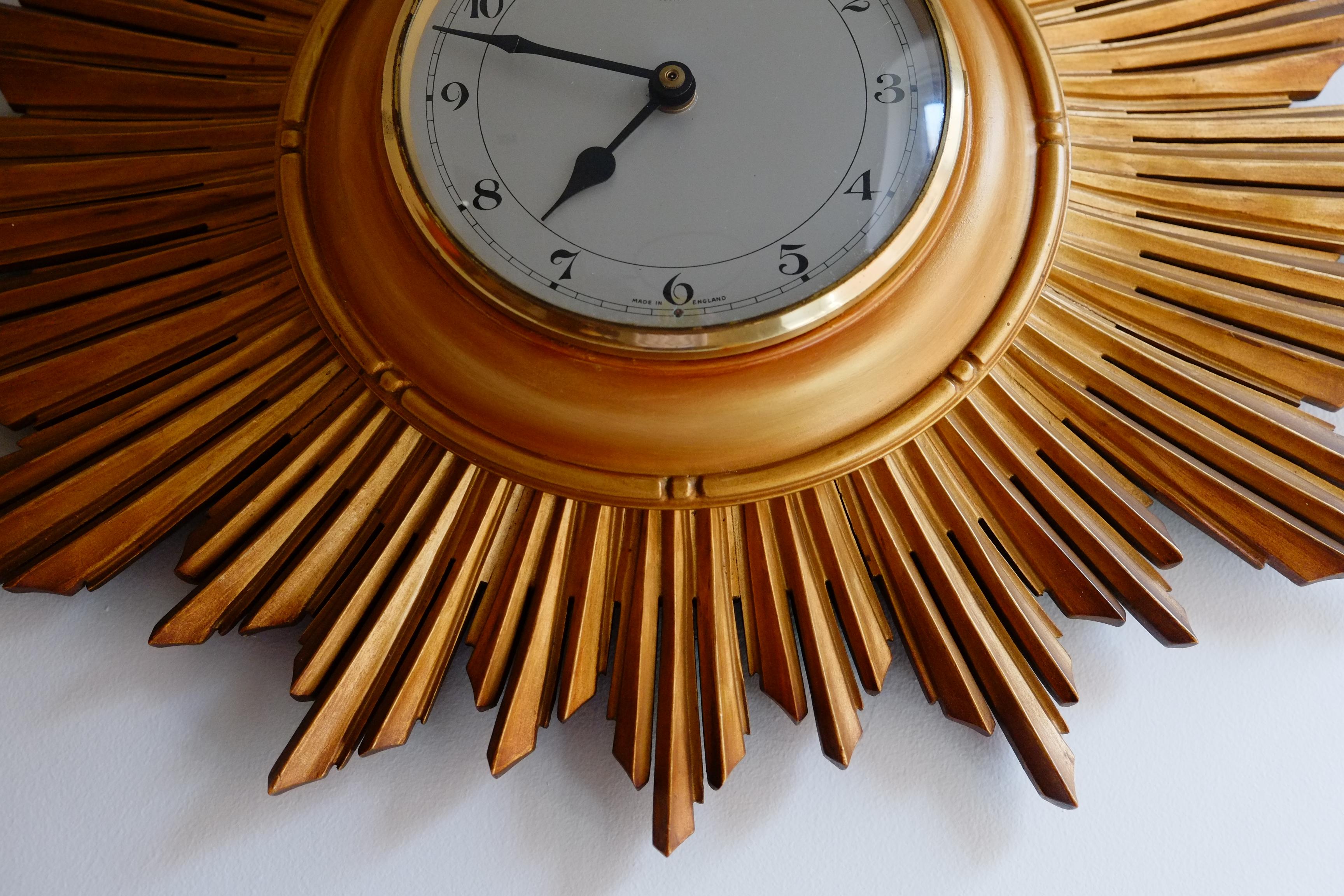 Late 20th Century Rare Gilt Wood Smiths Gold Sunburst Wall Clock. Made in England For Sale