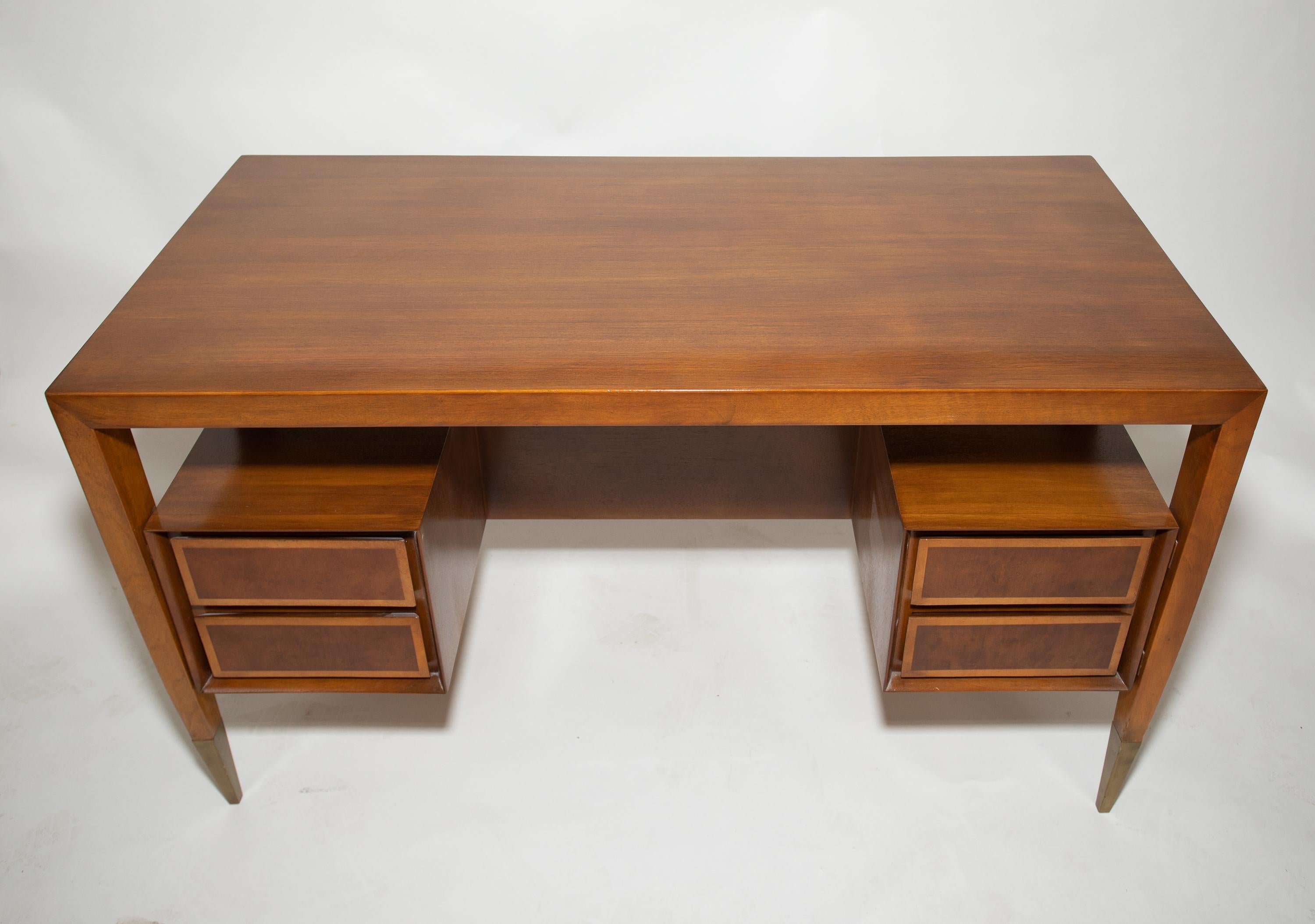 A Gio Ponti desk manufactured in Italy by Giordano Chiesa.
An early example with 2 tone drawer fronts.
Purchased at the Singer Showroom in NYC.
Purchased from the original family ownership.