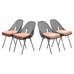 Rare ensemble de quatre chaises de salle à manger en métal perforé noir de Giuseppe De Vivo 
