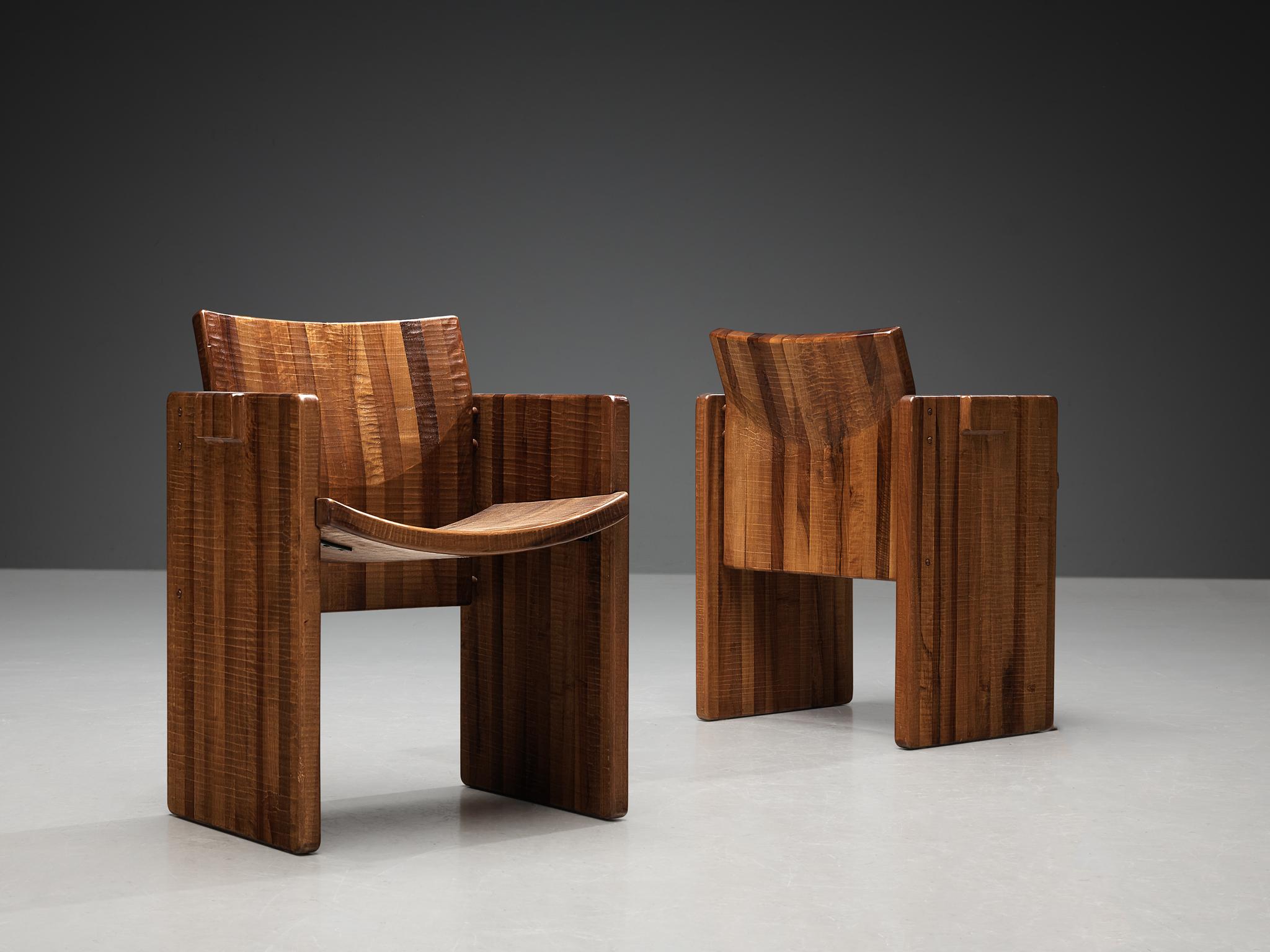 Giuseppe Rivadossi for Officina Rivadossi, pair of armchairs, walnut, Italy, 1980s

An exceptional pair of chairs by the Italian sculptor and designer Giuseppe Rivadossi, featuring a high level of craftsmanship in woodwork. This rare chair