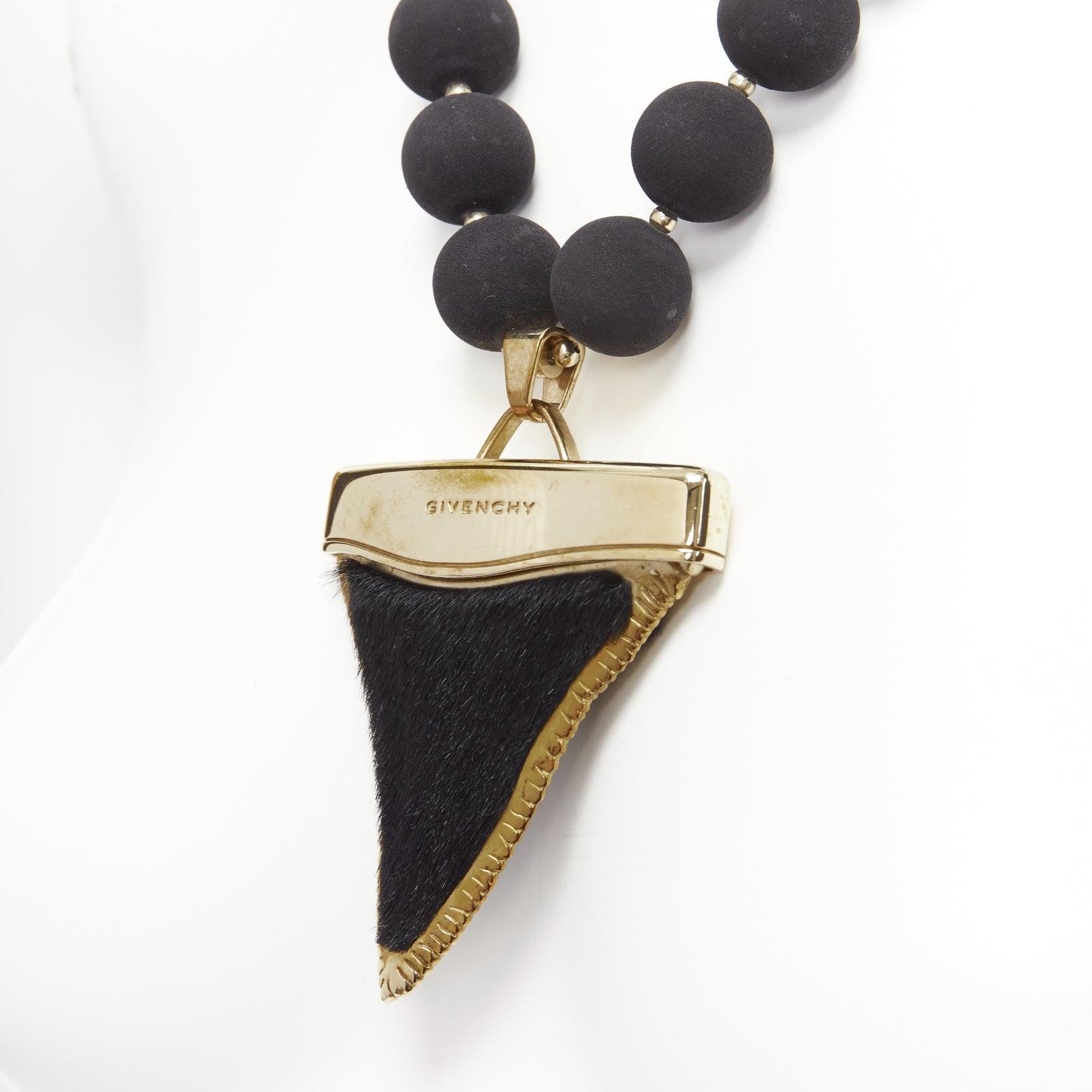 rare GIVENCHY Riccardo Tisci black pony hair shark tooth velvet ball necklace
Reference: TGAS/D01003
Brand: Givenchy
Designer: Riccardo Tisci
Material: Pony Hair, Metal
Color: Gold, Black
Pattern: Solid
Closure: Magnet
Lining: Black
Extra Details: