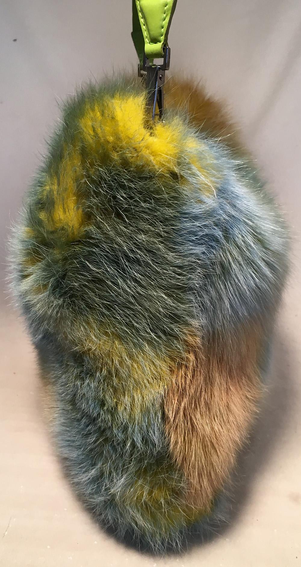 RARE Givenchy Vintage Multicolor Green Mink Fur Convertible Handbag Clutch in excellent condition. Multicolor mink fur in green, blue, light tan, and yellow trimmed with a green leather handle and gunmetal hardware. Top snap closure opens to a plaid