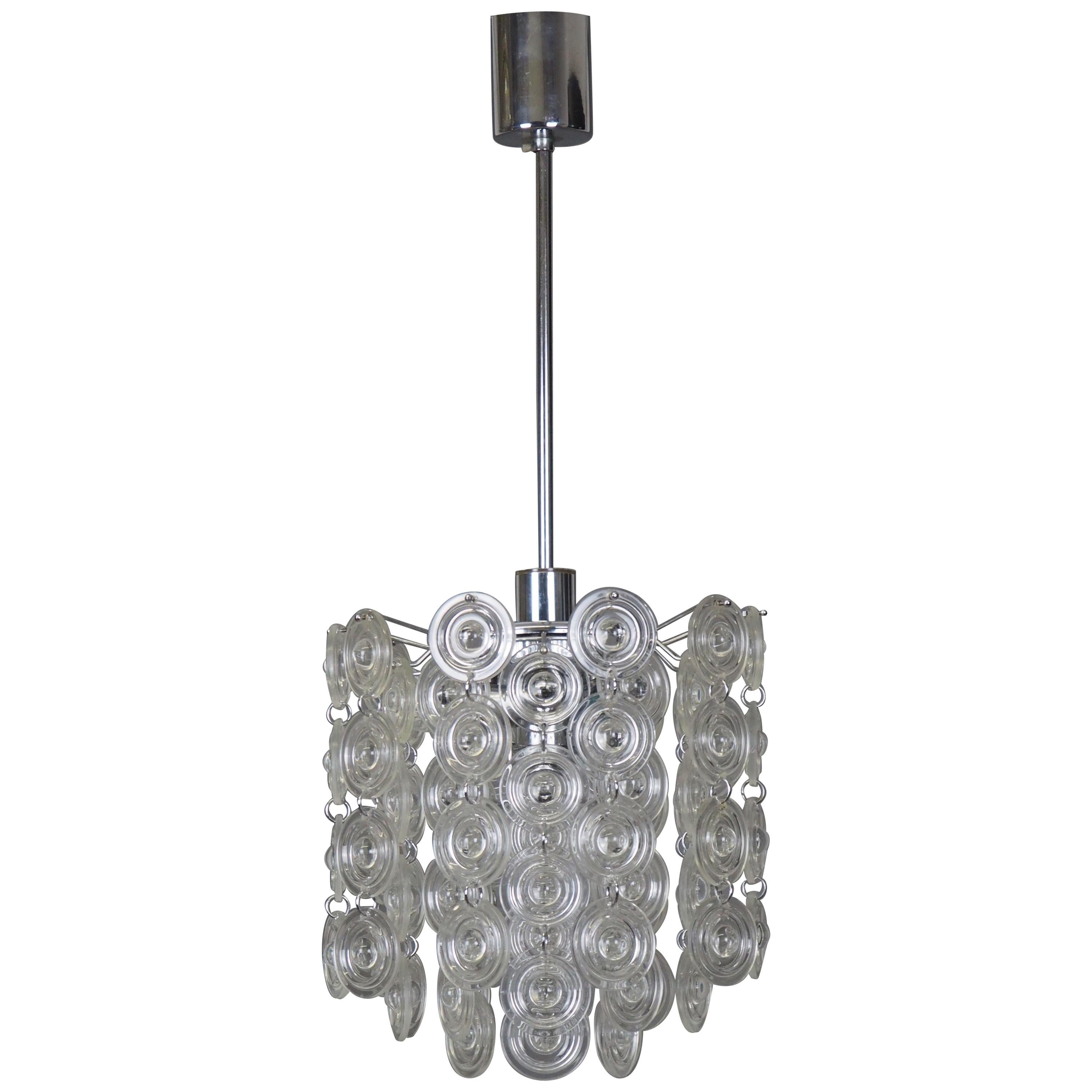 Rare mid - century glass and nickel chandelier by Sciolari, Italy, circa 1970s.
This high quality piece is made of many clear Murano glass disk hanging on the nickeled brass frame.

The totally height of chandelier is 27.1 inch (height of the