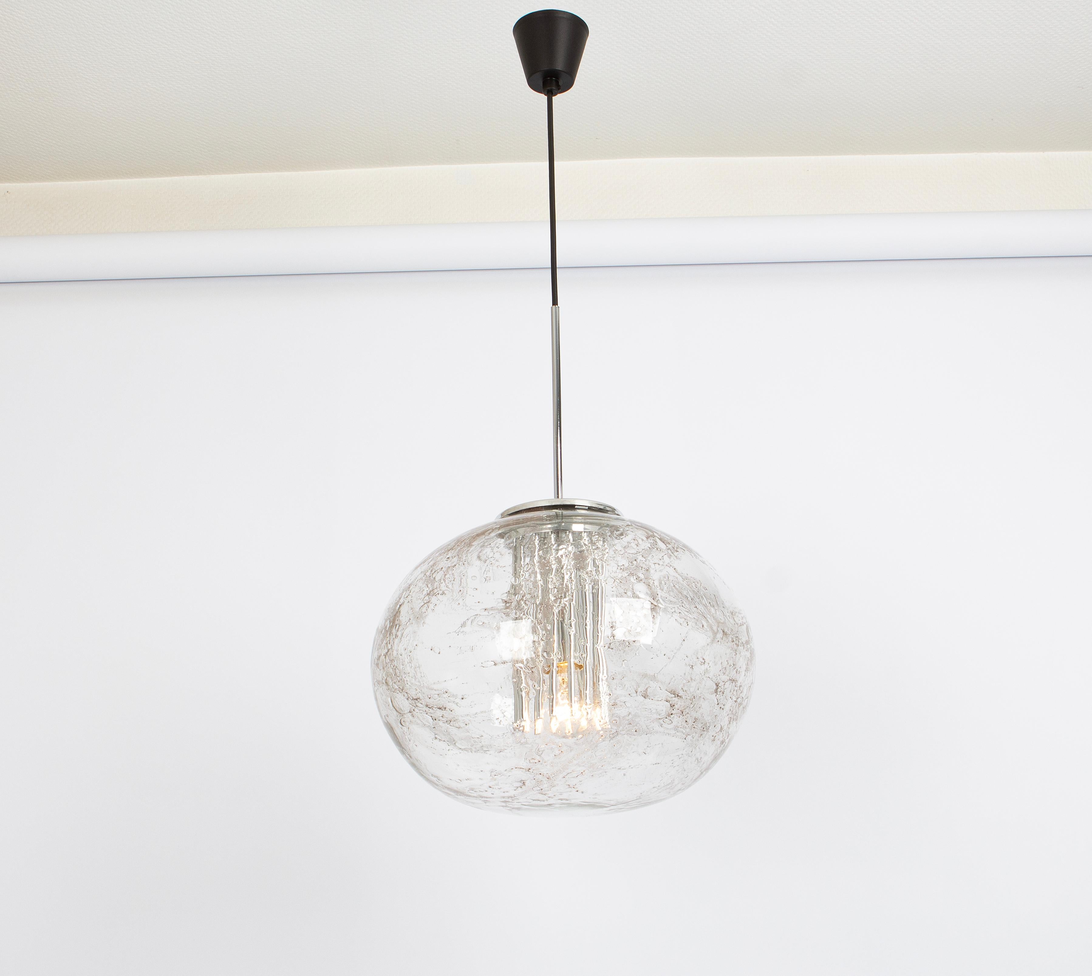 Doria ceiling light with large volcanic glass ball.
High quality of materials, gives a wonderful light effect when it is on.

Sockets: One E27 standard bulbs. Max 100 Watts.
Light bulbs are not included. It is possible to install this fixture in all