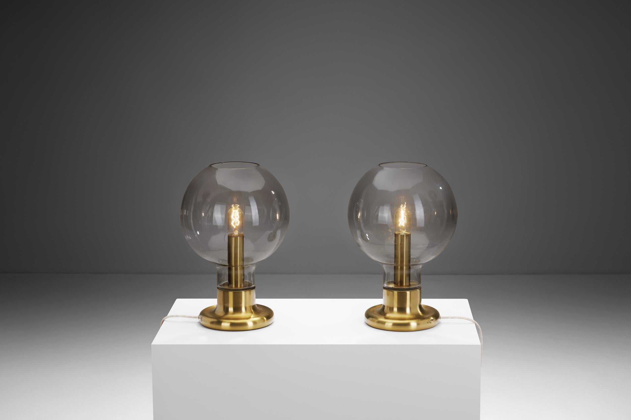 Gebrüder Cosack (Gecos), was a lighting company from Neheim-Hüsten, Germany founded in 1848. The company no longer exists, making remaining pieces hard to come by. This is especially true for these brass dome table lamps that are very rare.

With