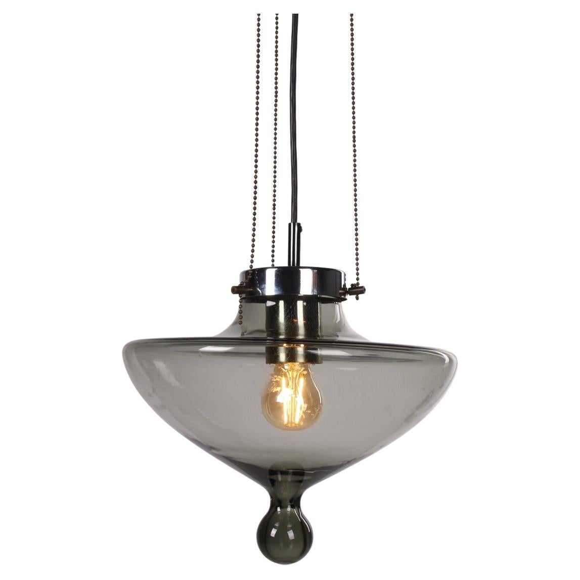 Lampe suspendue haute en verre rare par Raak, 1970