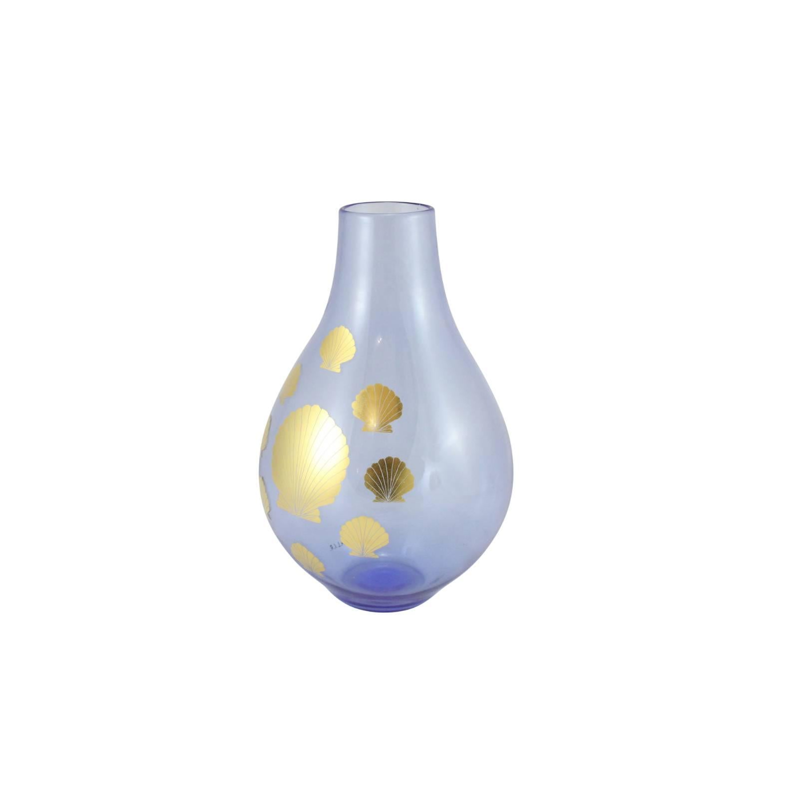 This fascinating piece is a rare and early glass vase by Piero Fornasetti, titled 'Vaso Della Shell' or Vase of Shells through collaboration with the Italian 'SALIR' - Studio Ars Labor Industrie Riunite.

An early example of Fornasetti, this
