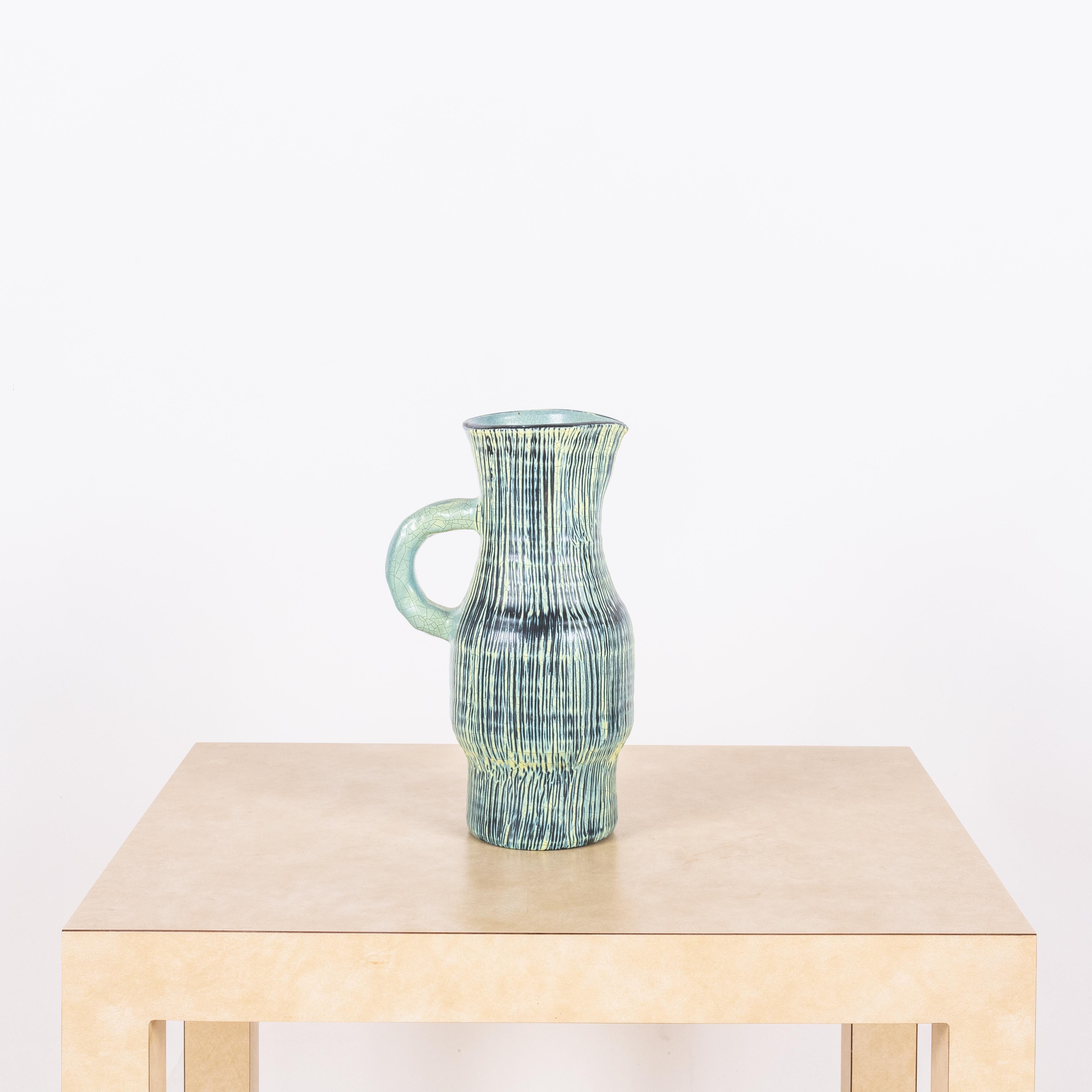 Rare glazed turquoise ceramic Accolay pitcher.