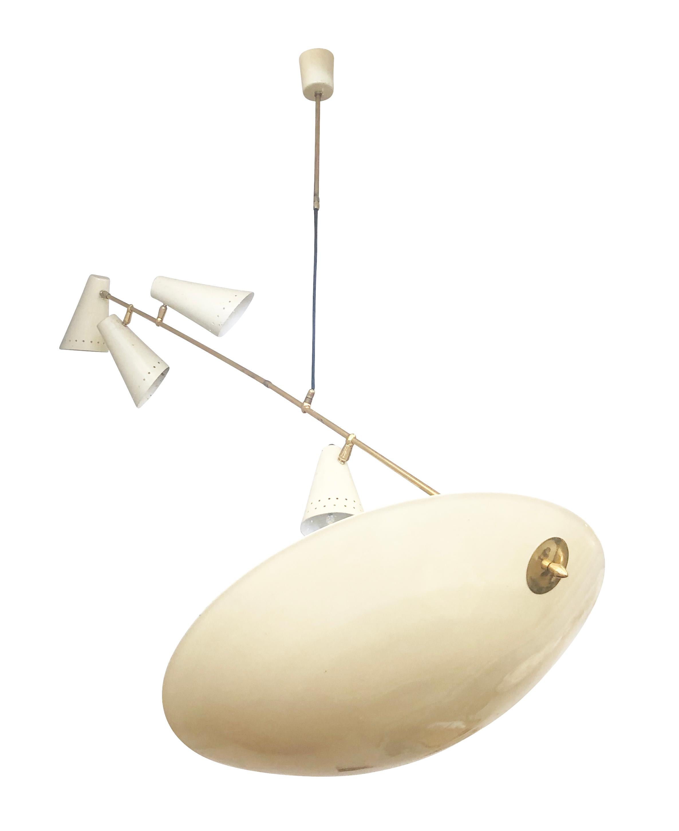 Rare ceiling light by G.M.C.E with five articulating shades mounted on a diagonal stem. Beige lacquered aluminium and brass construction. Holds 4 candelabra sockets in the smaller conical shades. Height can be easily changed by adjusting the fabric