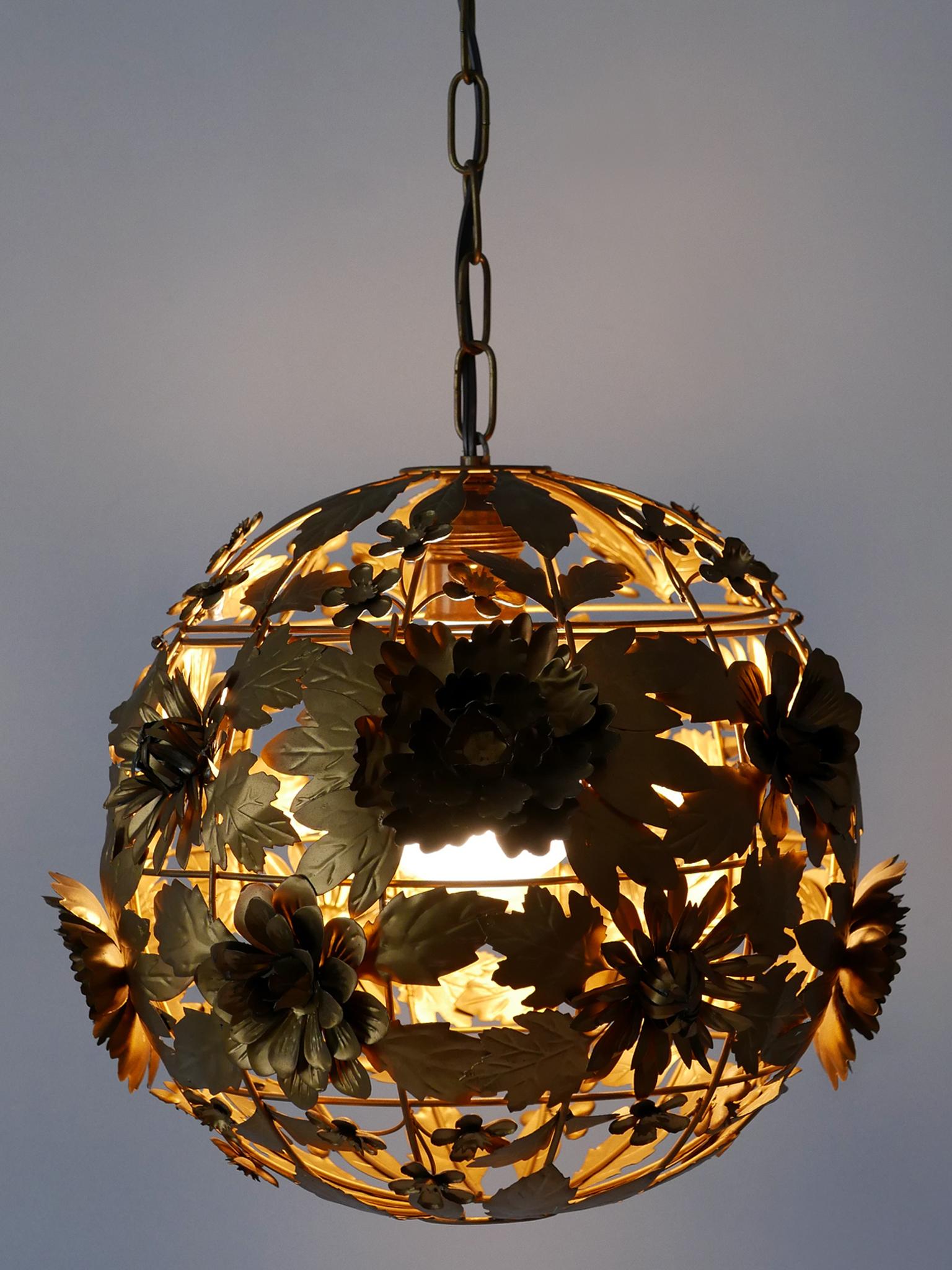 Extremely rare, amazing and highly decorative Mid-Century Modern metal floral pendant lamp. Manufactured in Germany, 1960s.

Executed in flower shaped, in gold color painted sheet metal, the pendant lamp needs 1 x E27 / E26 screw fit bulb. It works