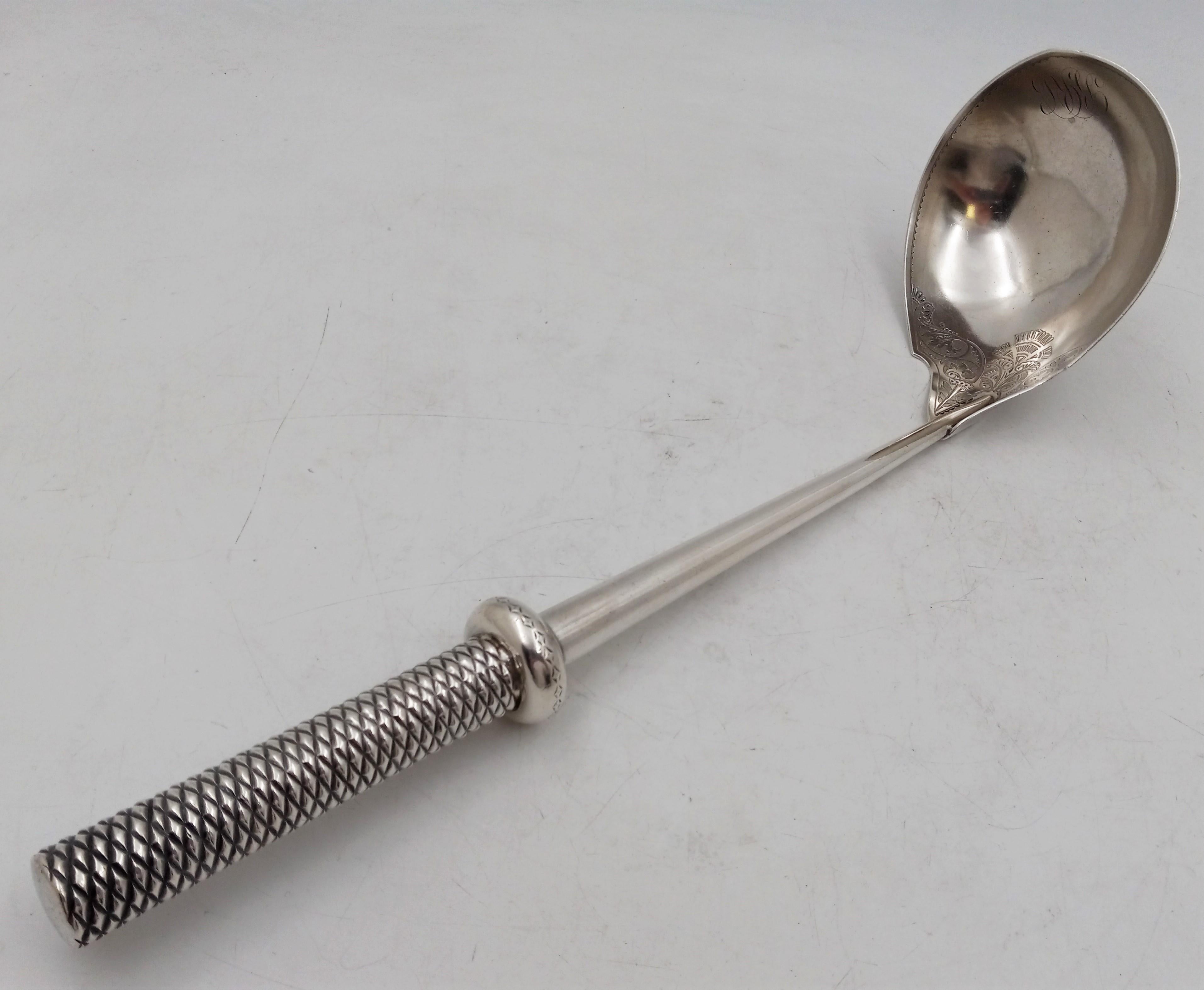 Extremely rare Gorham, sterling silver soup or punch ladle with intricate rope handle, and beautiful engraved, geometrically inspired motifs including stylized ivies from the last quarter of the 19th century. It measures 14'' in length by 3 3/4'' in