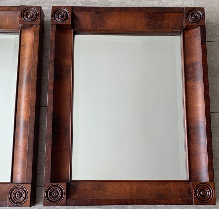 French Rare and Great Condition Pair of Early 1800s Empire Style Nutwood Wall Mirrors For Sale