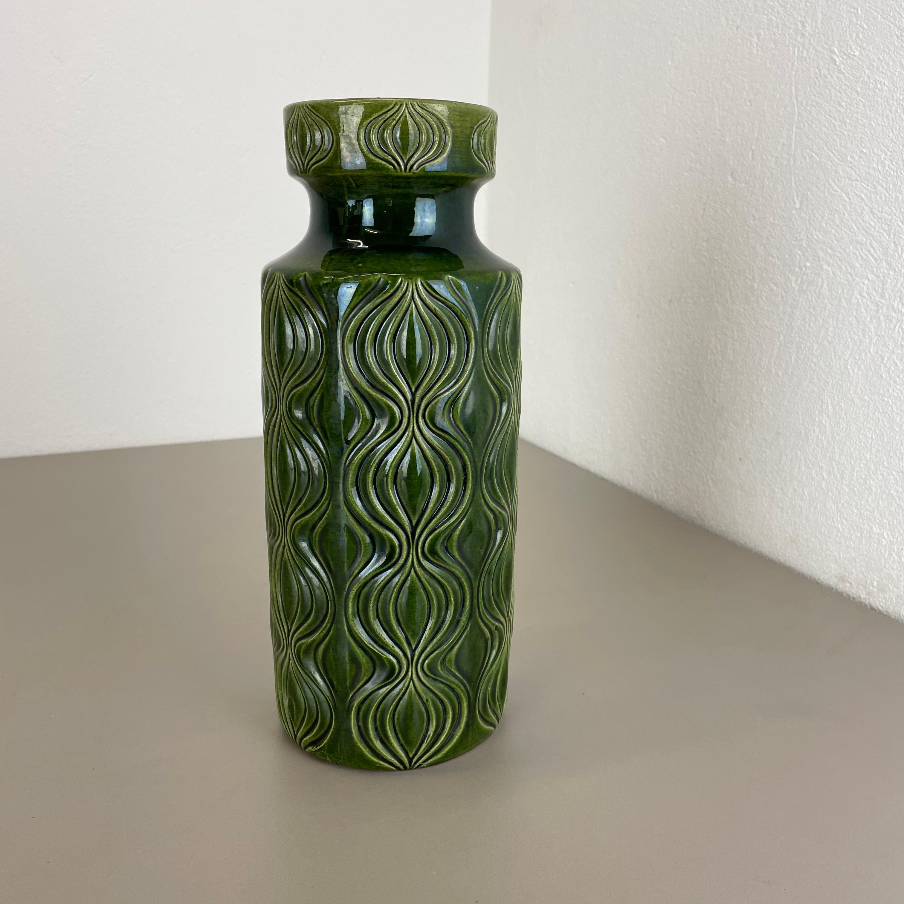 Article:

Fat lava art vase


Producer:

Scheurich, Germany


Design:

Nr. 285-30



Decade:

1970s


Description:

This original vintage vase was produced in the 1970s in Germany. It is made of porcelain in fat lava optic.