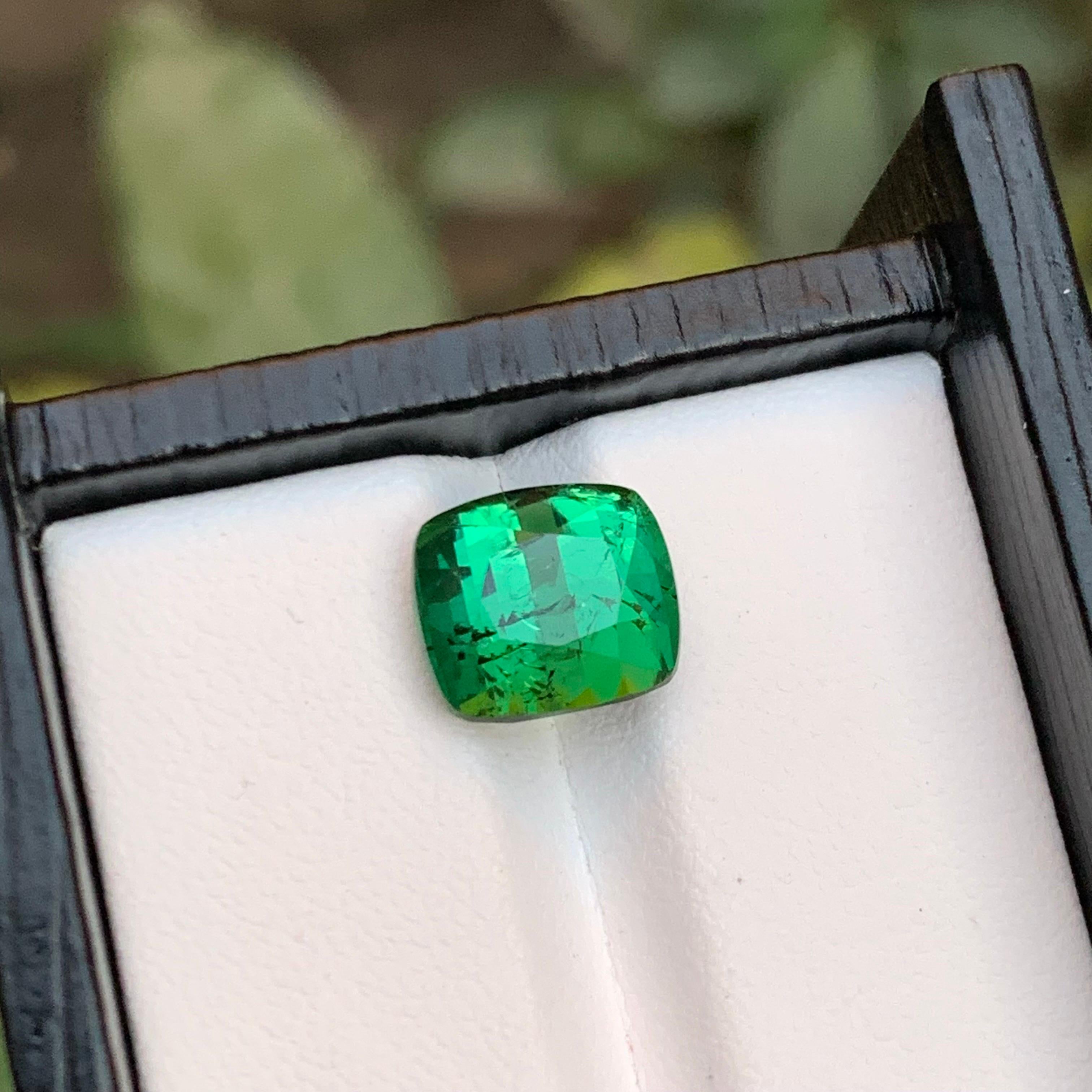 Remarkable Cushion Cut Bluish Green Natural Tourmaline from Kunar Mines of Afghanistan with excellent luster. 

Gemstone Type: Tourmaline
Weight: 5.05 Carats
Dimensions: 8.78 x 9.99 x 7.44 mm
Color: Green
Clarity: Slightly Included
Treatment: Not
