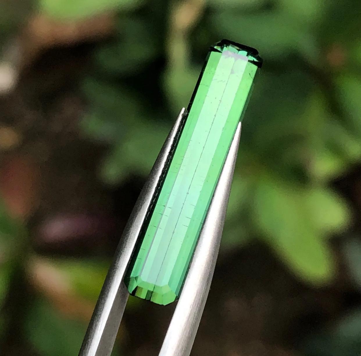 Gemstone Type: Tourmaline
Weight: 5.15 Carats
Dimensions: 25.97 x 5.23 x 3.91
Color: Green
Clarity: Chip on Girdle Approx 95% Eye Clean
Treatment: Not Treated
Origin: Afghanistan
Certificate: On demand 

Discover the allure of our rare green