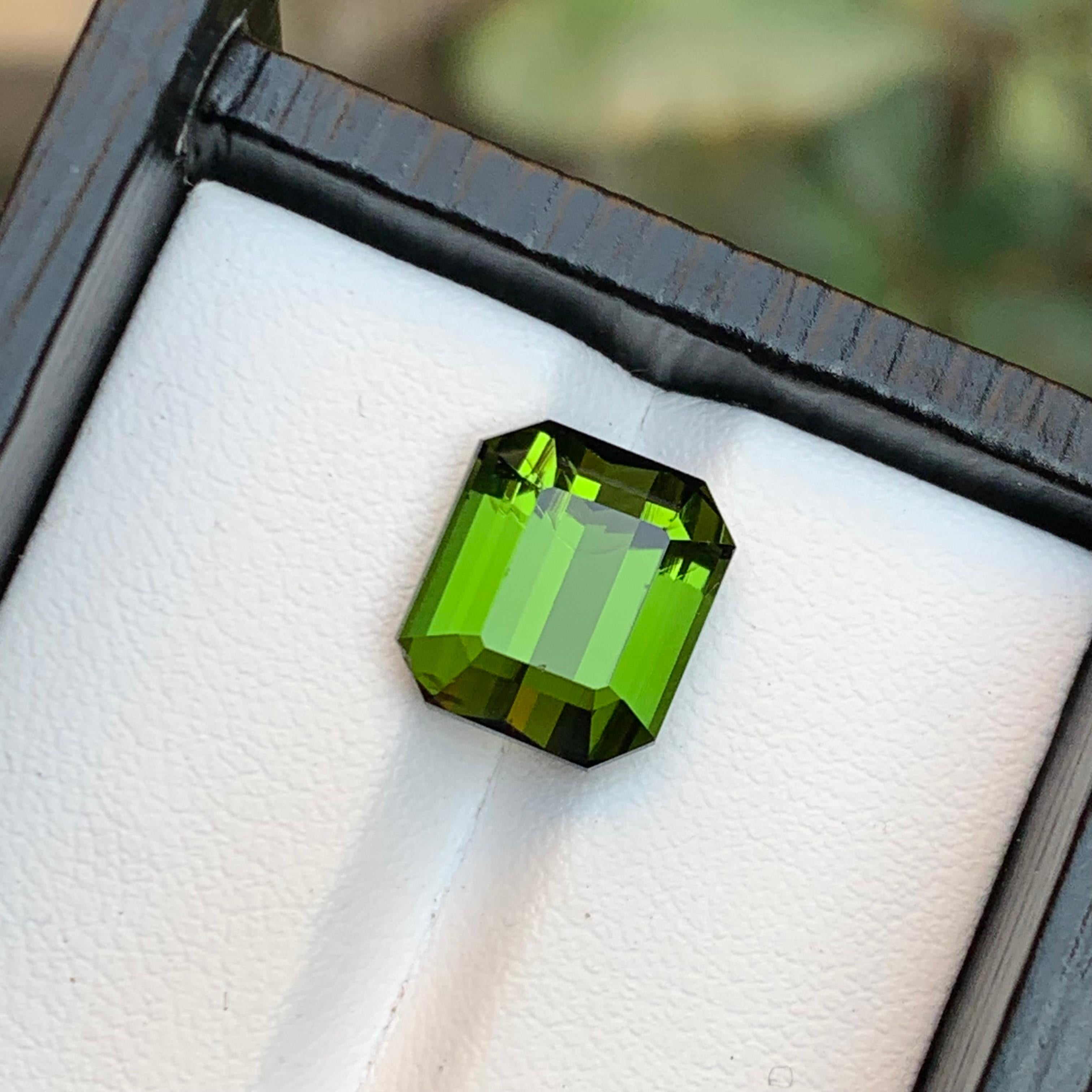 A stunning 6.25-carat natural yellowish hue green tourmaline from Afghanistan, showcasing a vibrant hue with excellent brilliance. Measuring 11.03 x 9.80 x 7.12 mm, this gem features approximately 98% eye-clean clarity, ensuring exceptional