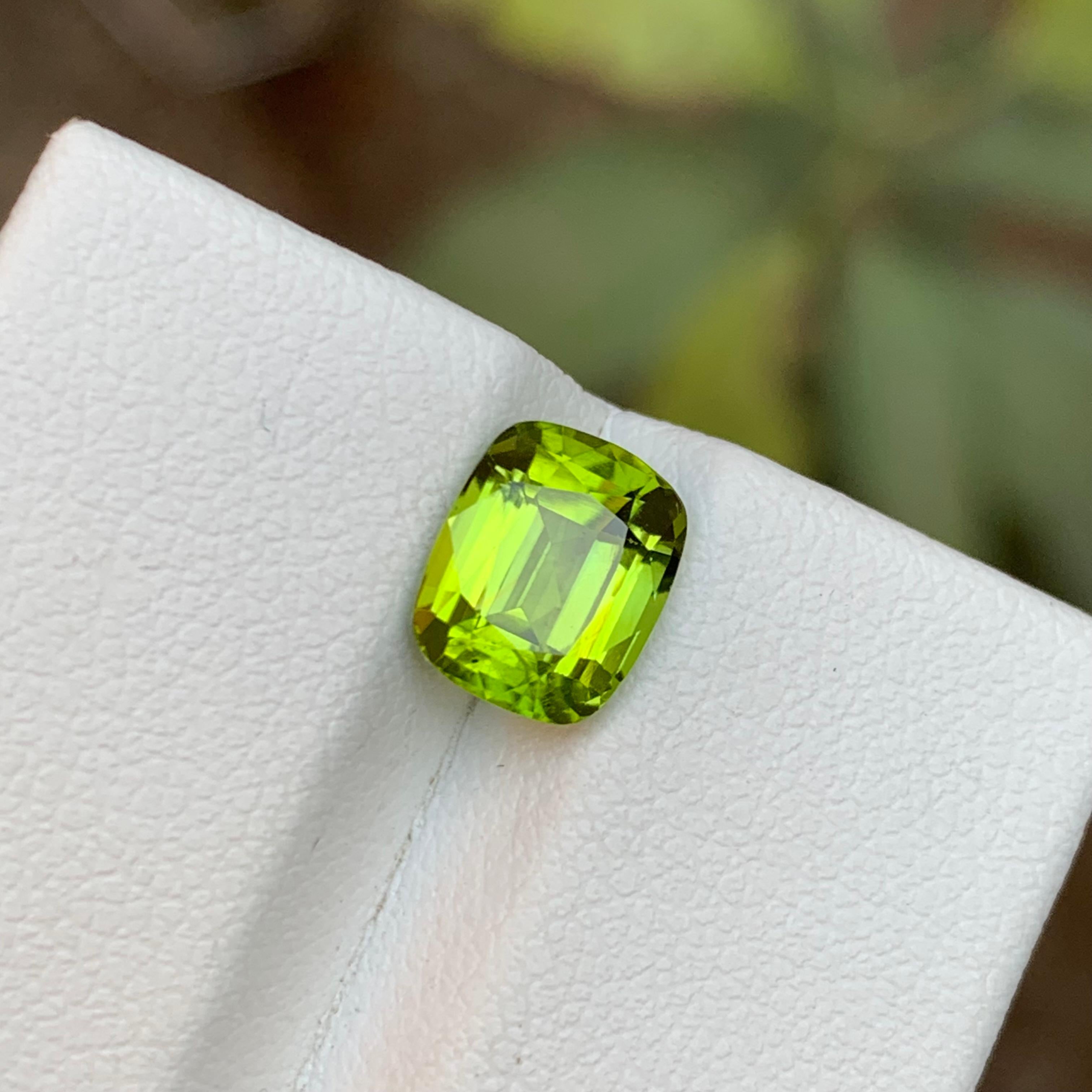 GEMSTONE TYPE: Peridot
PIECE(S): 1
WEIGHT: 2.30 Carats
SHAPE: Cushion 
SIZE (MM): 8.30 x 6.80 x 4.78
COLOR: Green
CLARITY: Eye Clean
TREATMENT: None
ORIGIN: Pakistan 
CERTIFICATE: On demand

Embrace the beauty of nature with this captivating 2.30