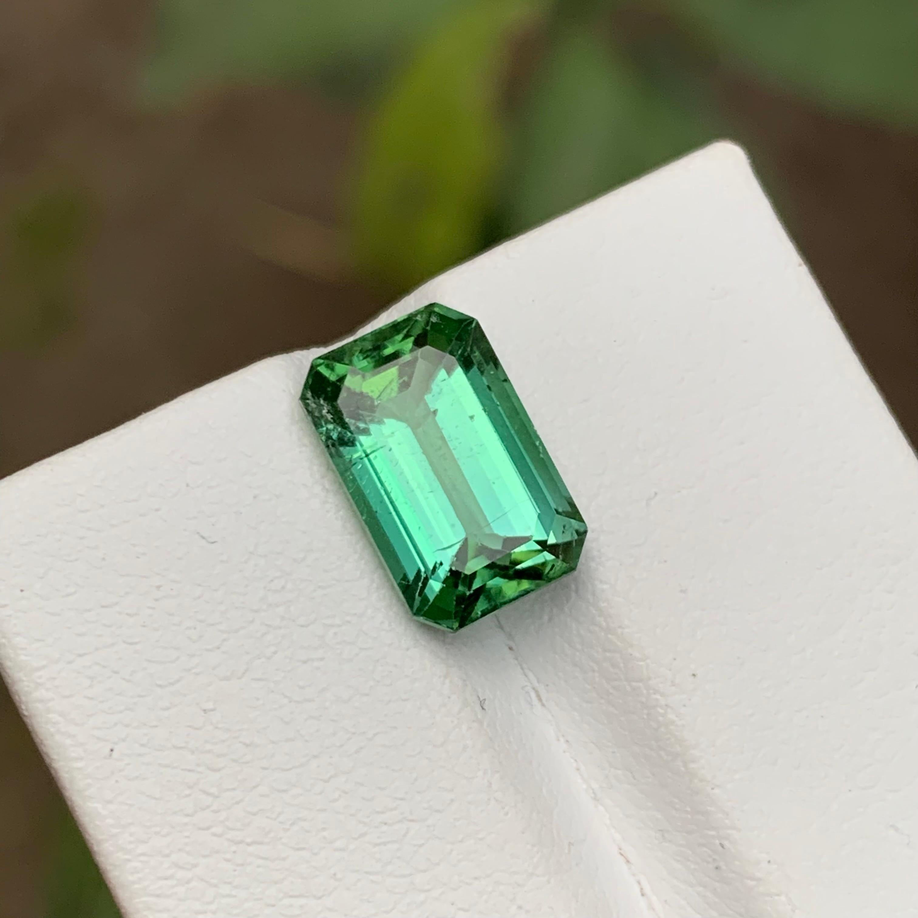 GEMSTONE TYPE: Tourmaline
PIECE(S): 1
WEIGHT: 4.80 Carats
SHAPE: Step Emerald Cut
SIZE (MM): 11.92 x 7.74 x 6.01
COLOR: Green
CLARITY: Slightly Included 
TREATMENT: None
ORIGIN: Afghanistan
CERTIFICATE: On demand

Elevate your ensemble with our