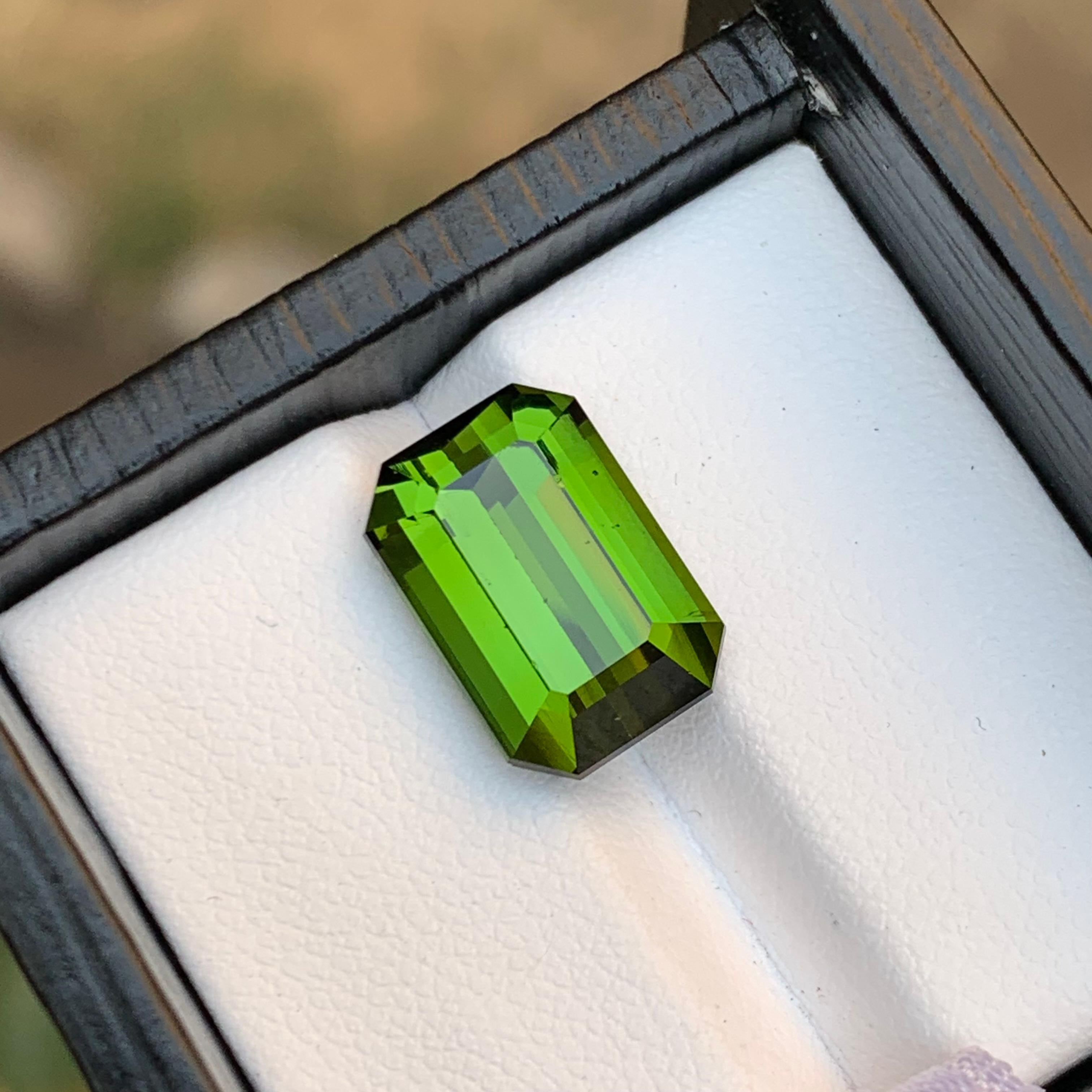 Elevate your jewelry creations with our stunning 7.75-Carats natural Tourmaline loose gemstone. Sourced from the Tourmaline mines of Afghanistan, this exceptional piece is meticulously cut and polished in an elegant emerald cut design. Revel in the